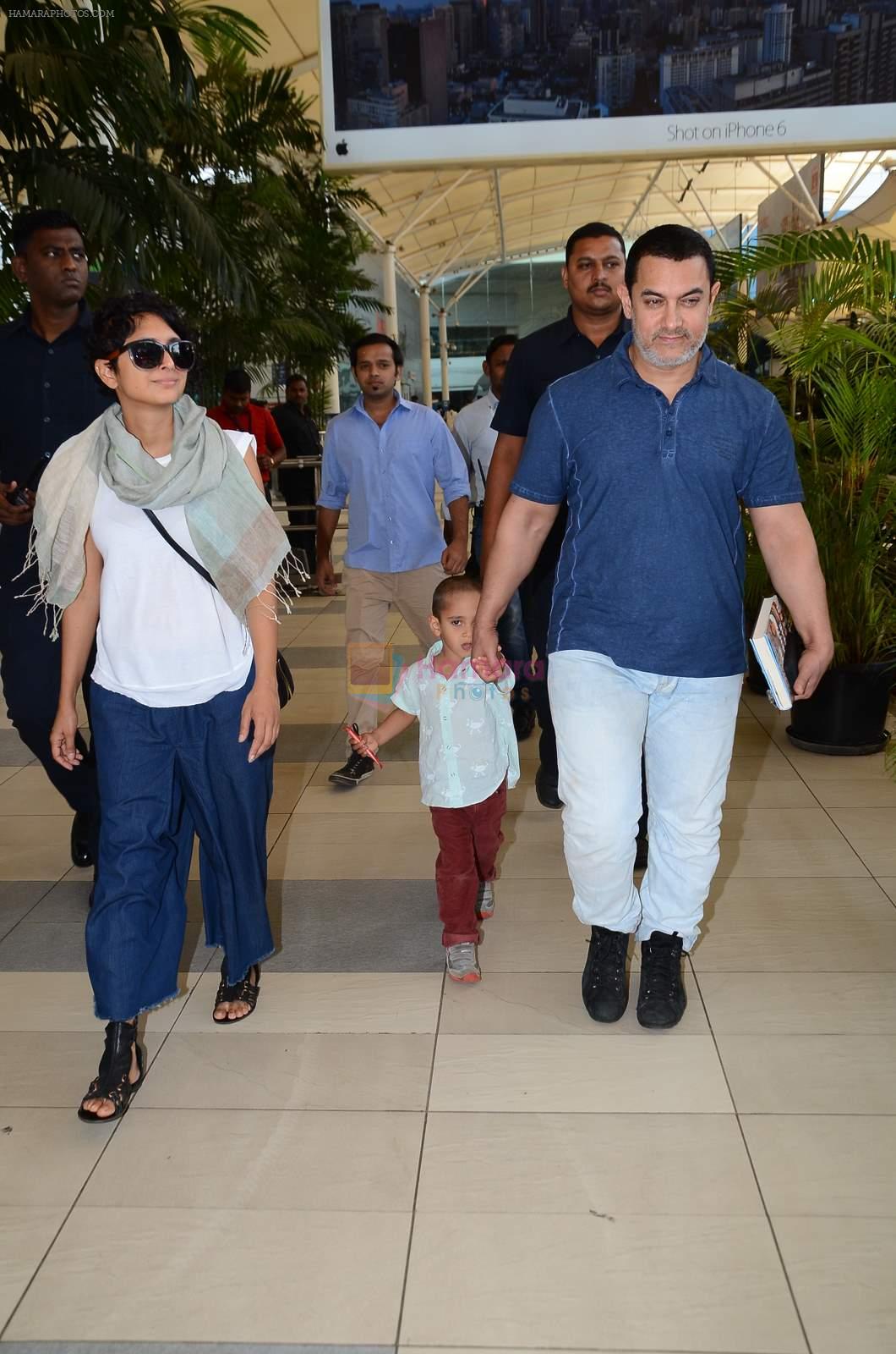 Aamir Khan snapped with Kiran Rao and Azad at airport in Mumbai on 8th March 2015