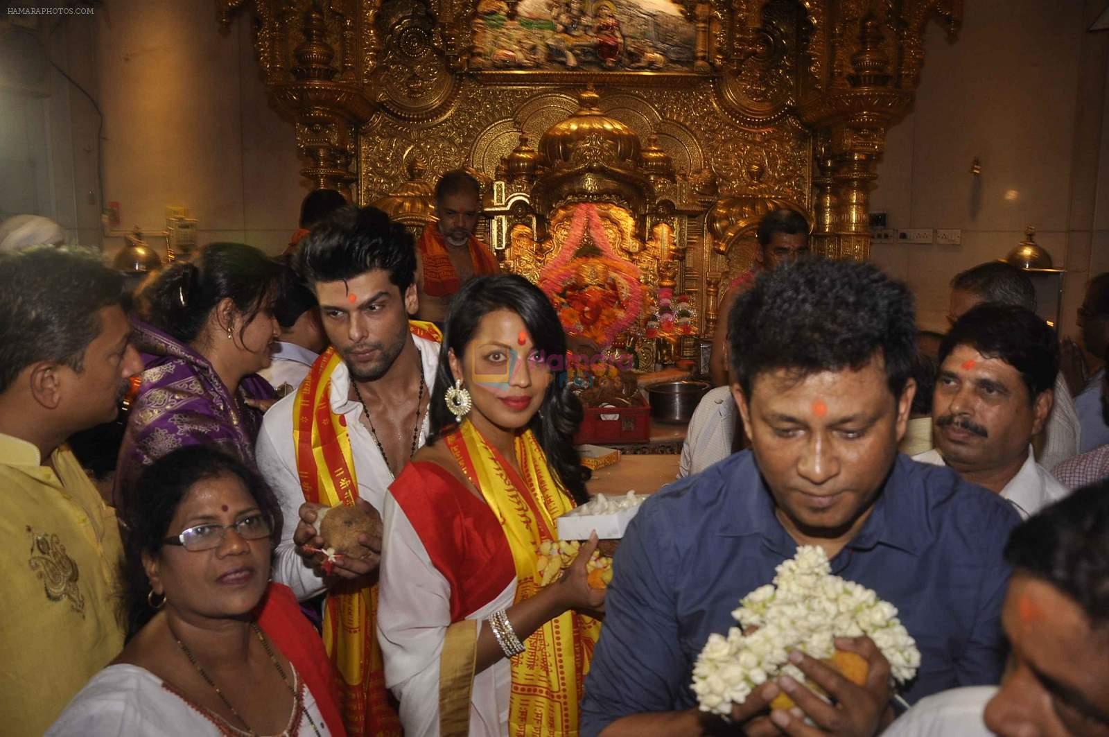 Mugdha Godse, Kushal Tandon visits Siddhivinayak Temple for the Muhurat of her film on 4th June 2015