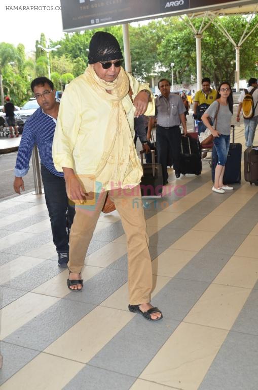 Mithun Chakraborty snapped at Mumbai airport on 5th July 2015