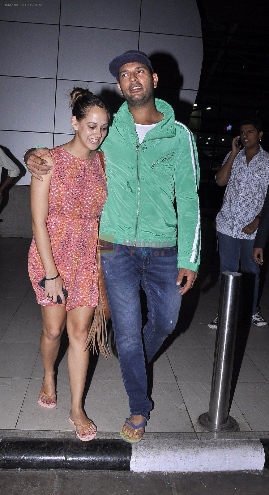 Yuvraj Singh and Hazel Keech post their engagement snapped at the airport on 17th Nov 2015