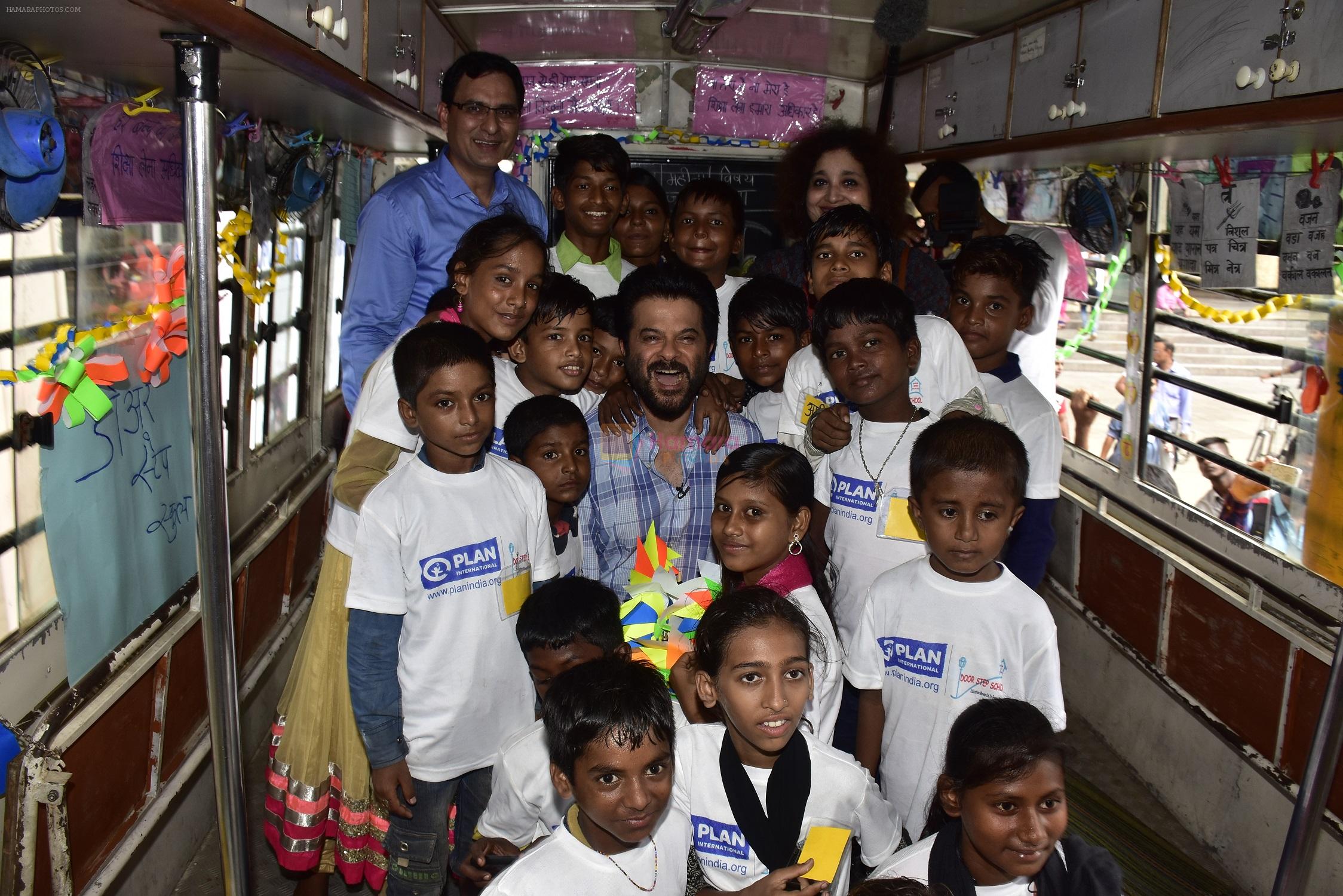 Anil Kapoor with children at 'school on wheels_ to campaign against child labourers