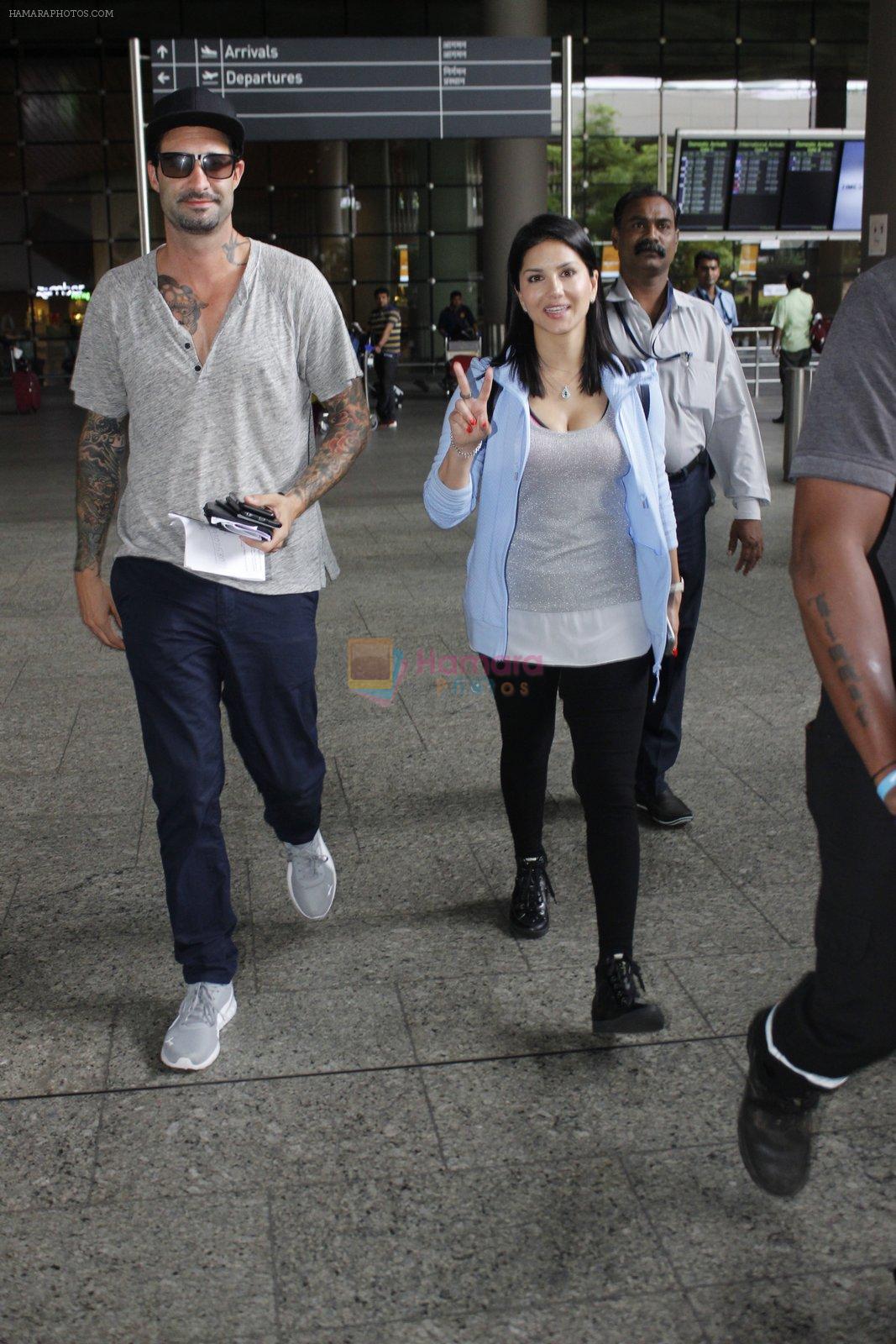 Sunny Leone with husband Daniel Weber at the airport on June 24, 2016