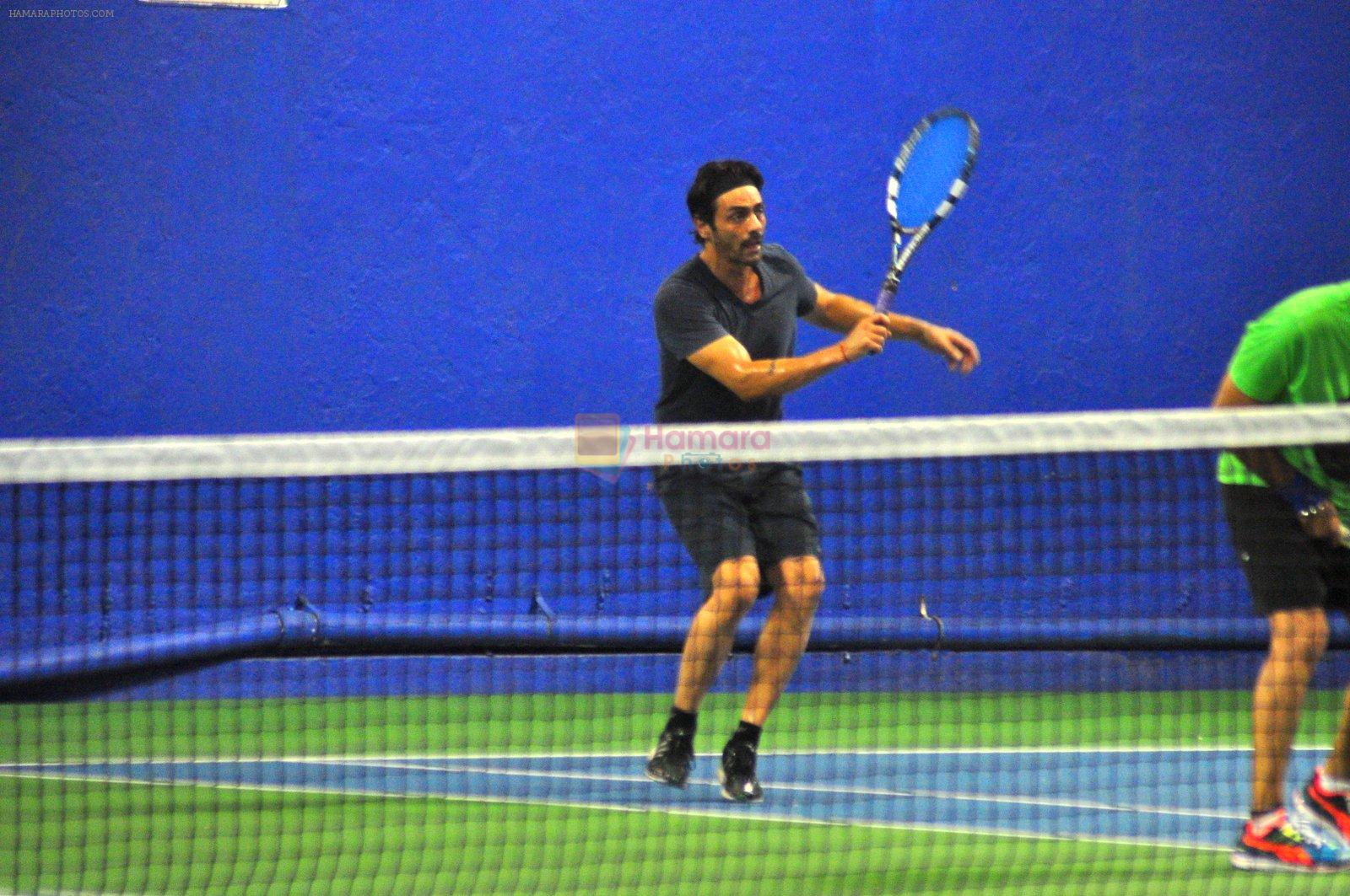 Arjun Rampal snapped playing tennis in Mumbai on 12th July 2016