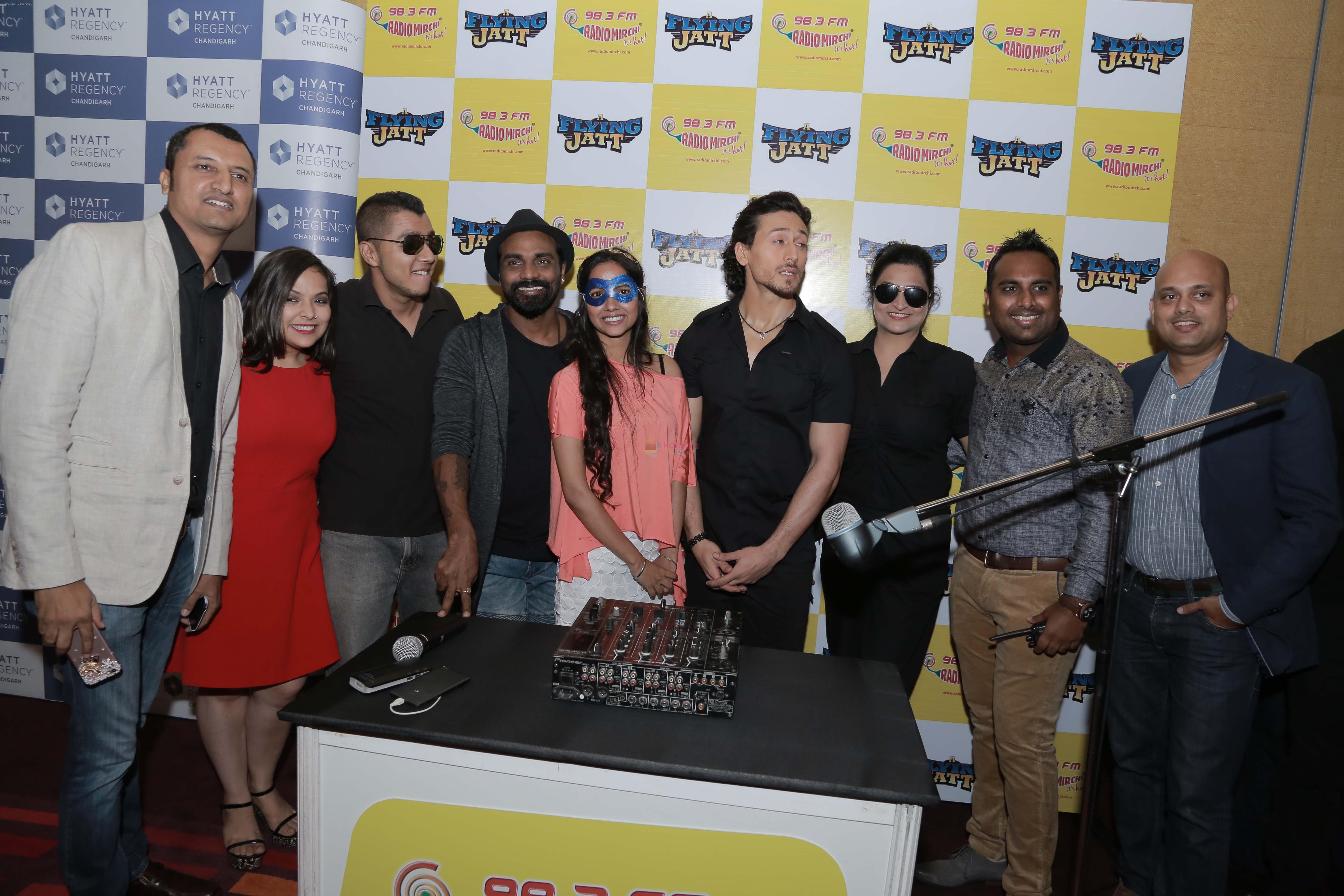 Tiger Shroff, Remo D Souza at the release of Mirchi 98.3 FM launches in Chandigarh on 12th Aug 2016