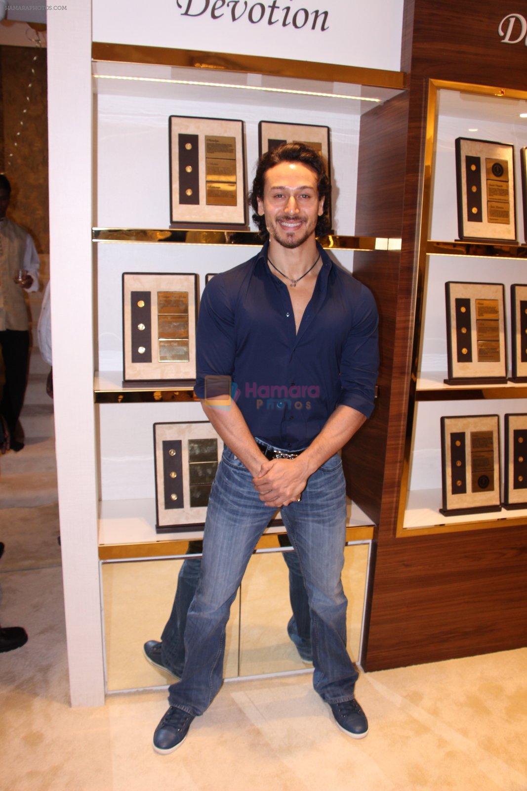 Tiger Shroff during the launch of India's first customized gold coin store IBJA Gold, in Mumbai on 7th Sept 2016
