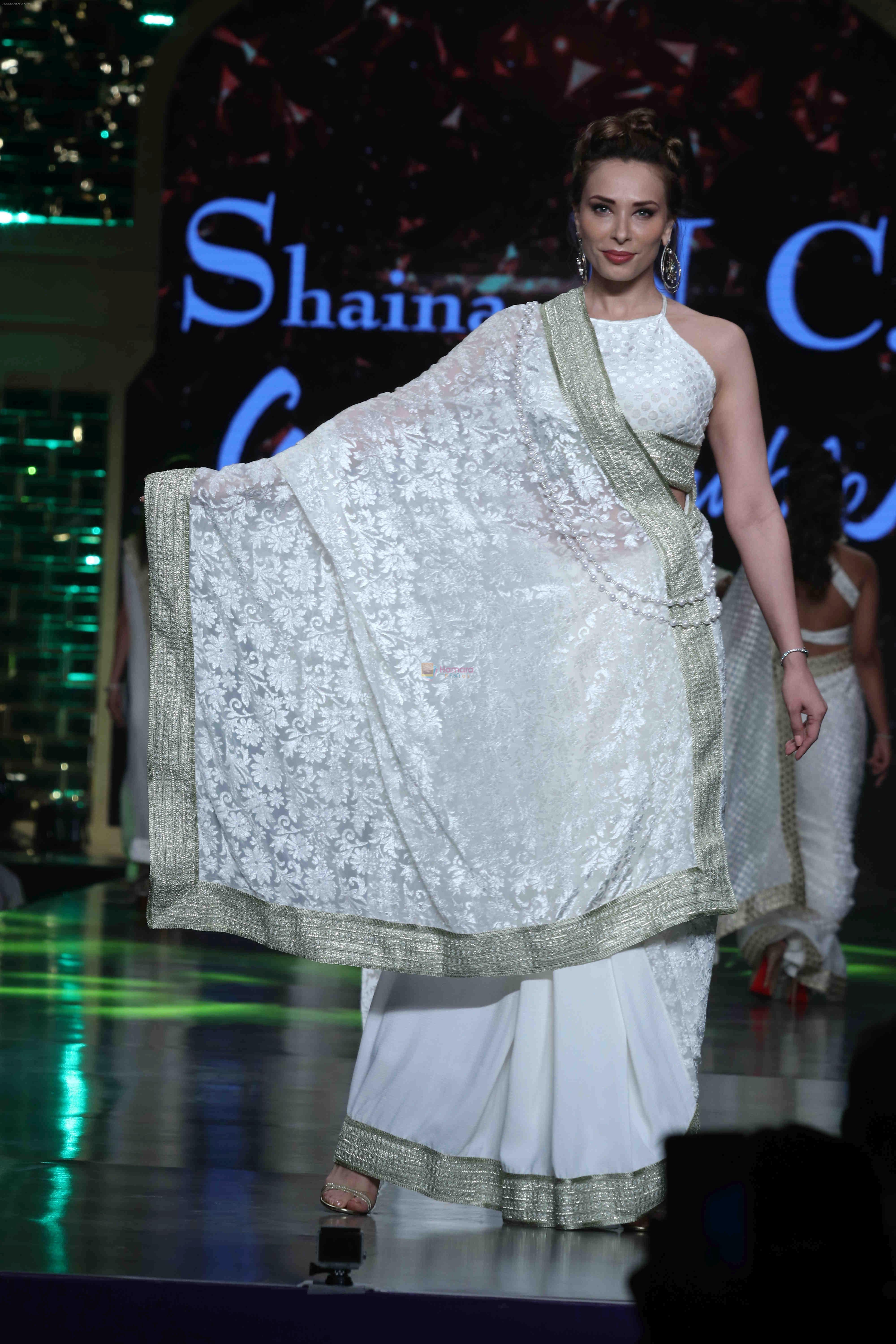 Lulia Vantur walk the ramp at 12th Annual Caring with Style fashion show