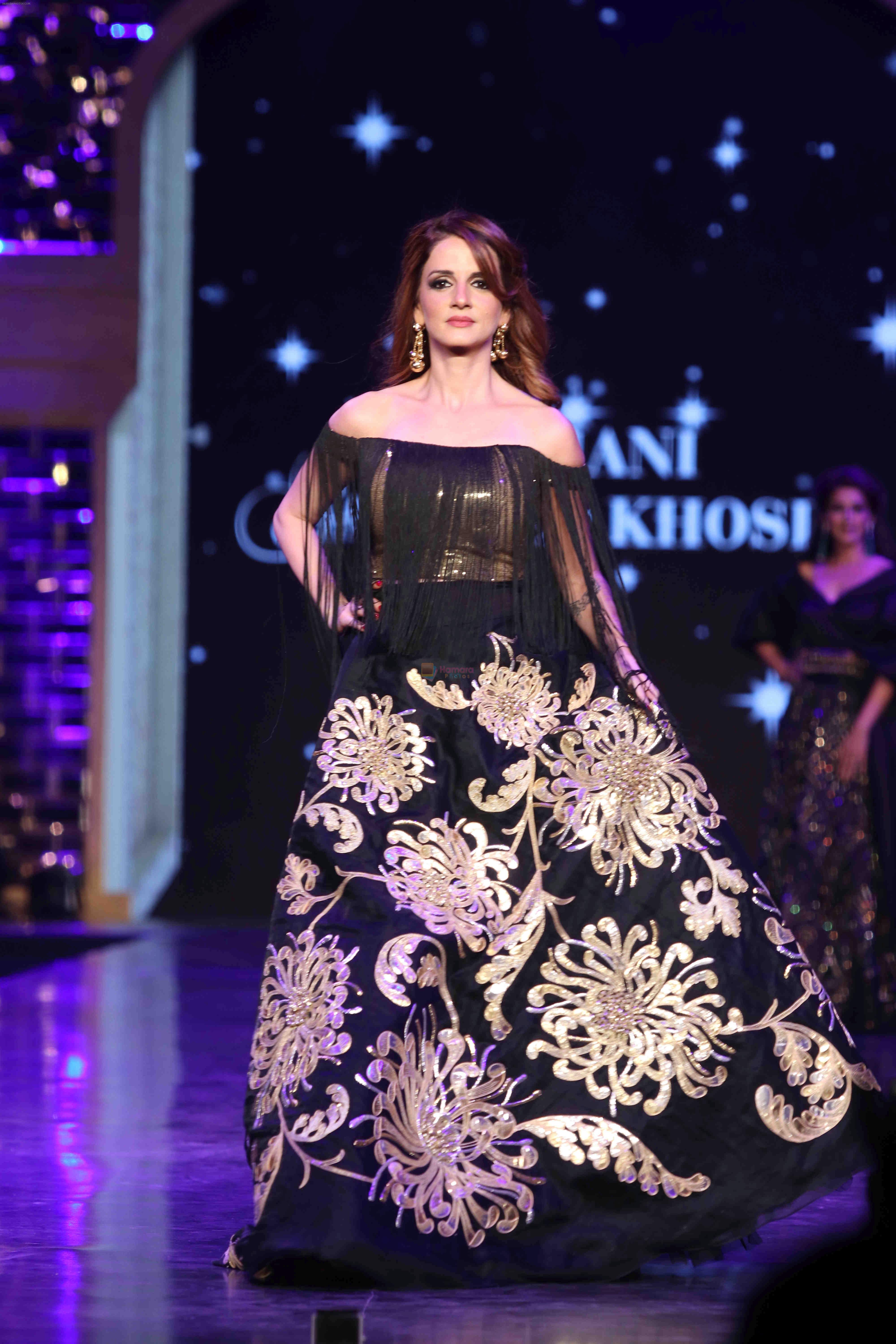 Suzanne Khan walk the ramp at 12th Annual Caring with Style fashion show