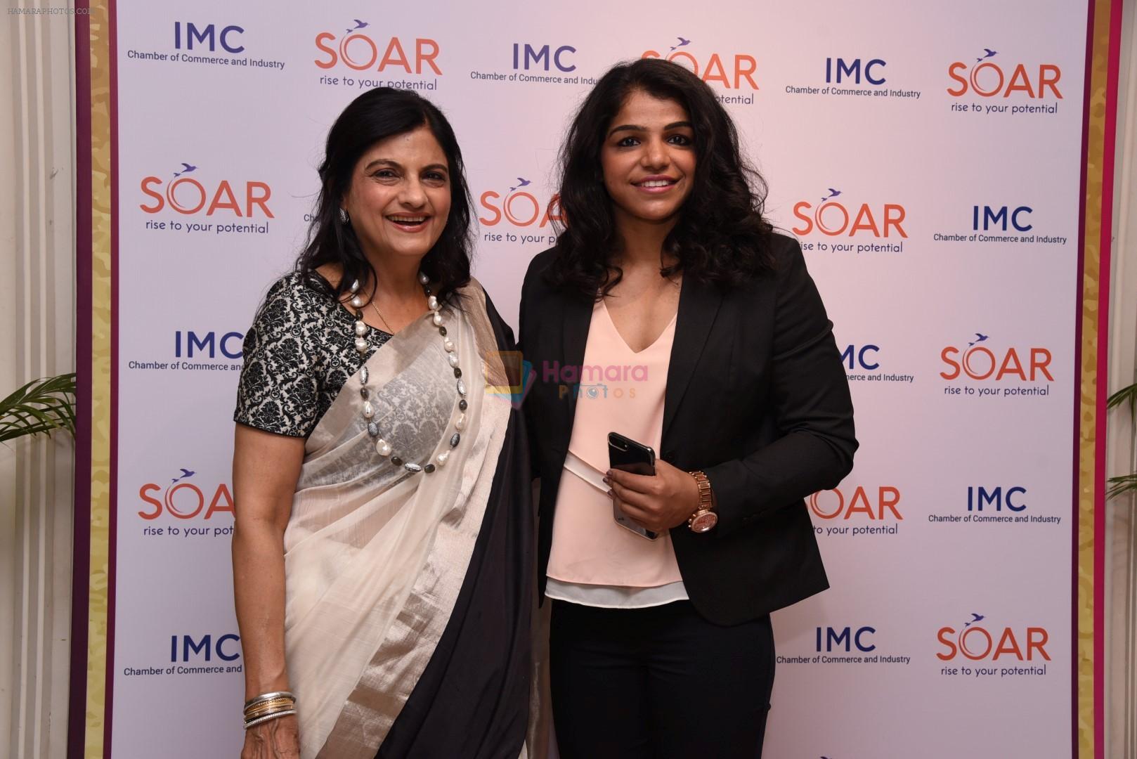 Radhika Nath, President IMC Ladies Wing and Sakshi Malik at the IMC Ladies Wing's 50th Year Anniversary