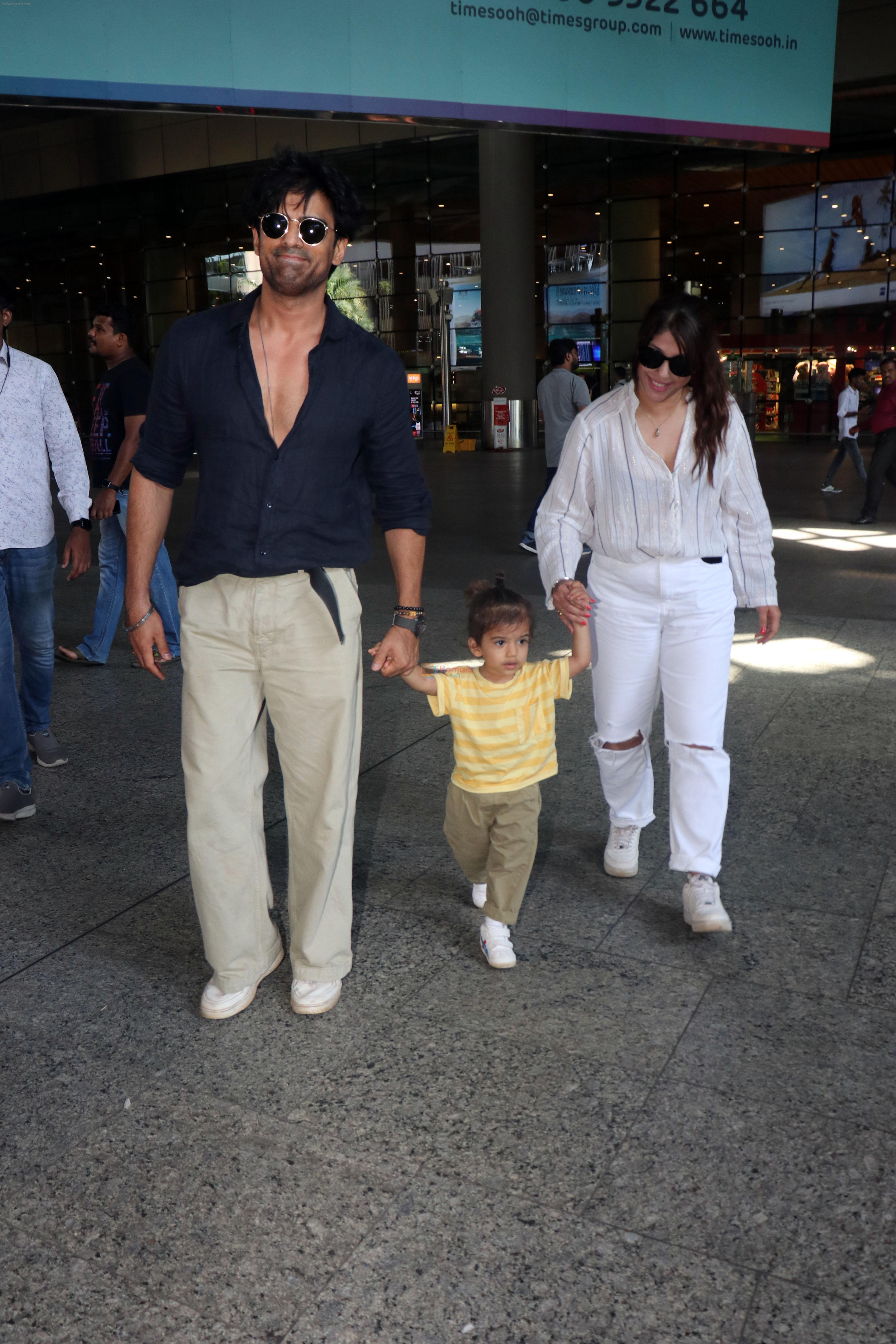 Addite Malik, Mohit Malik along with their child at the aiport on 20th May 2023