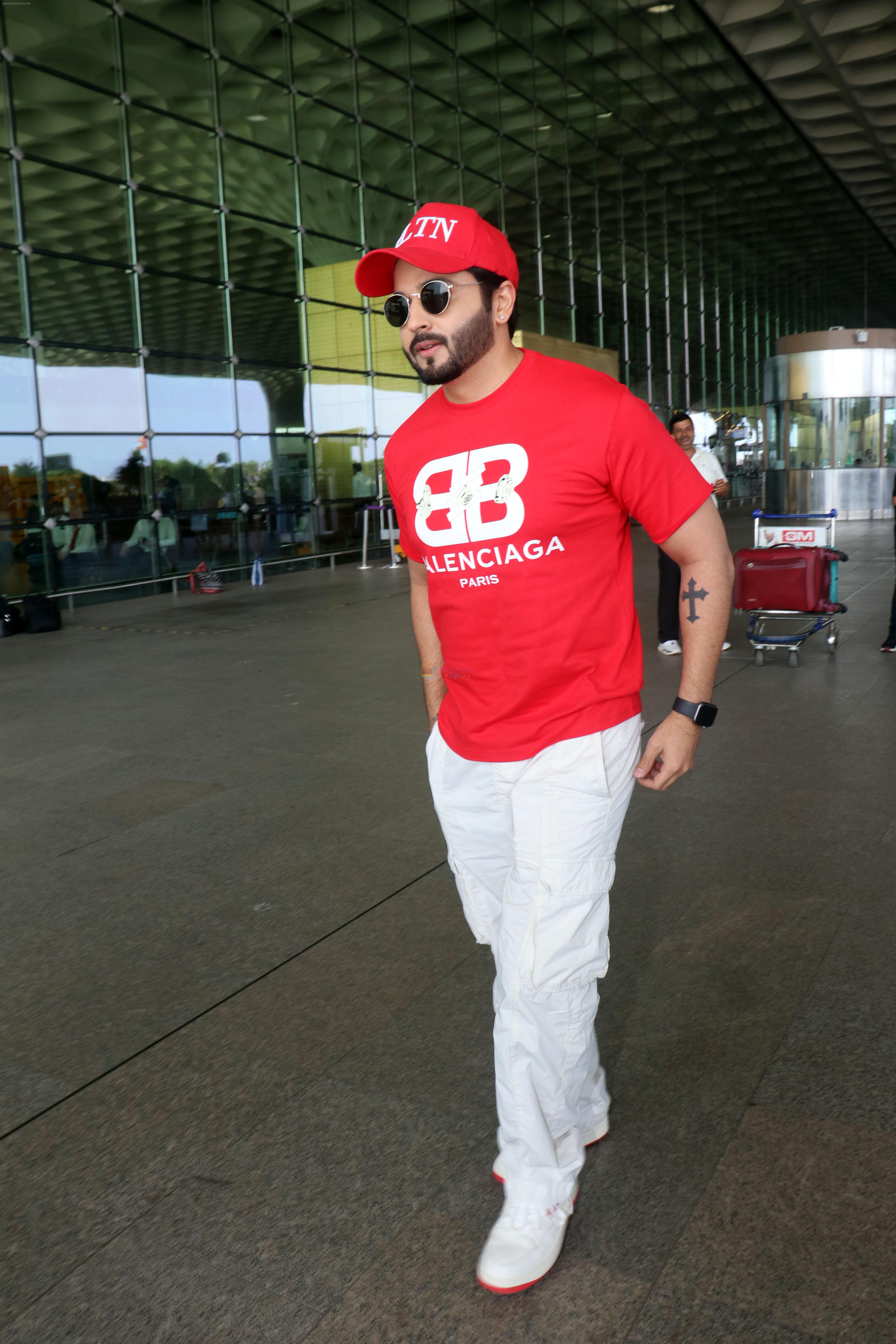Dheeraj Dhoopar wearing VLTN Cap Balenciaga Paris T-Shirt White Pants and Shoes with red sole on 24 May 2023