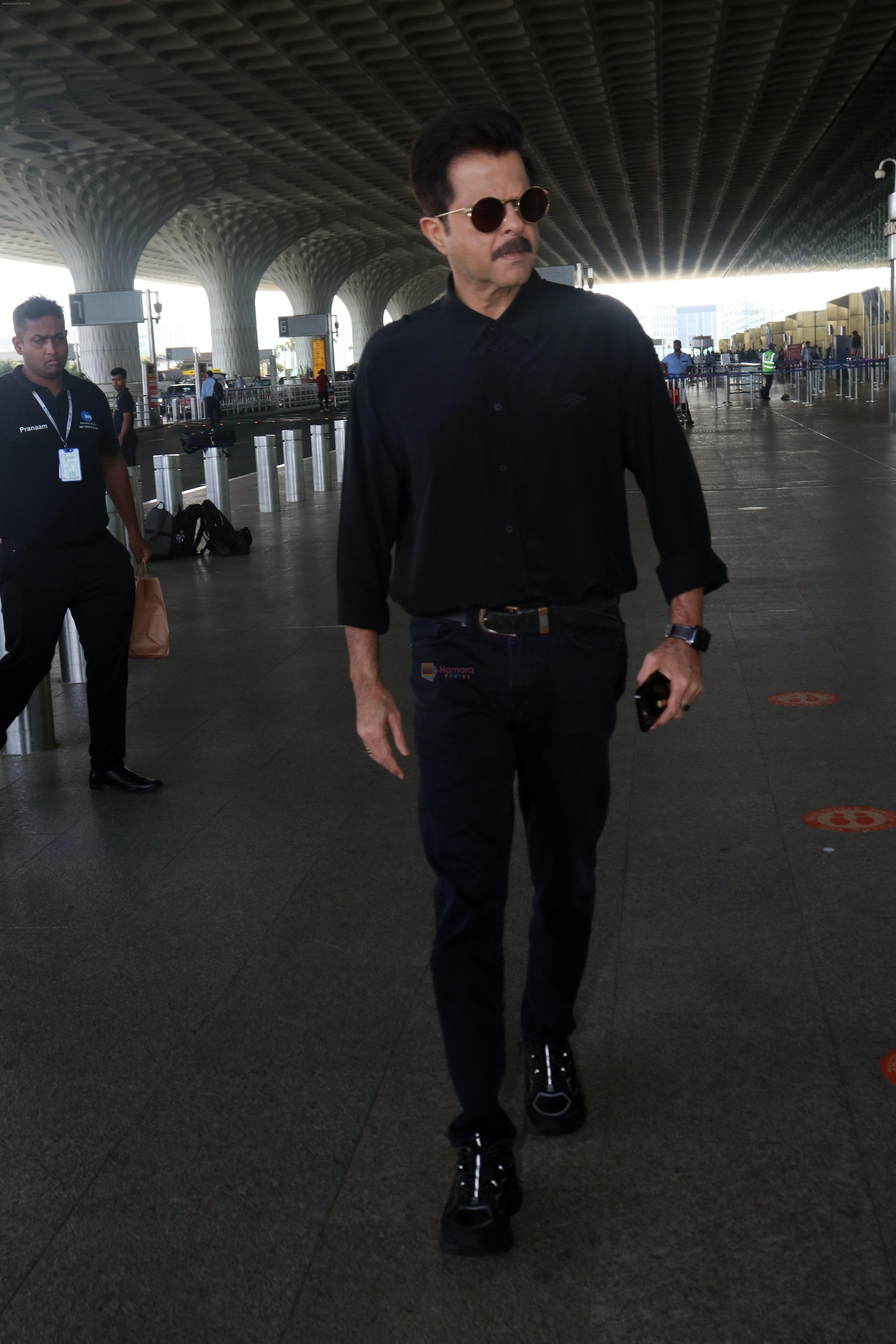 Anil Kapoor dressed in black with shades at the airport on 19th May 2023