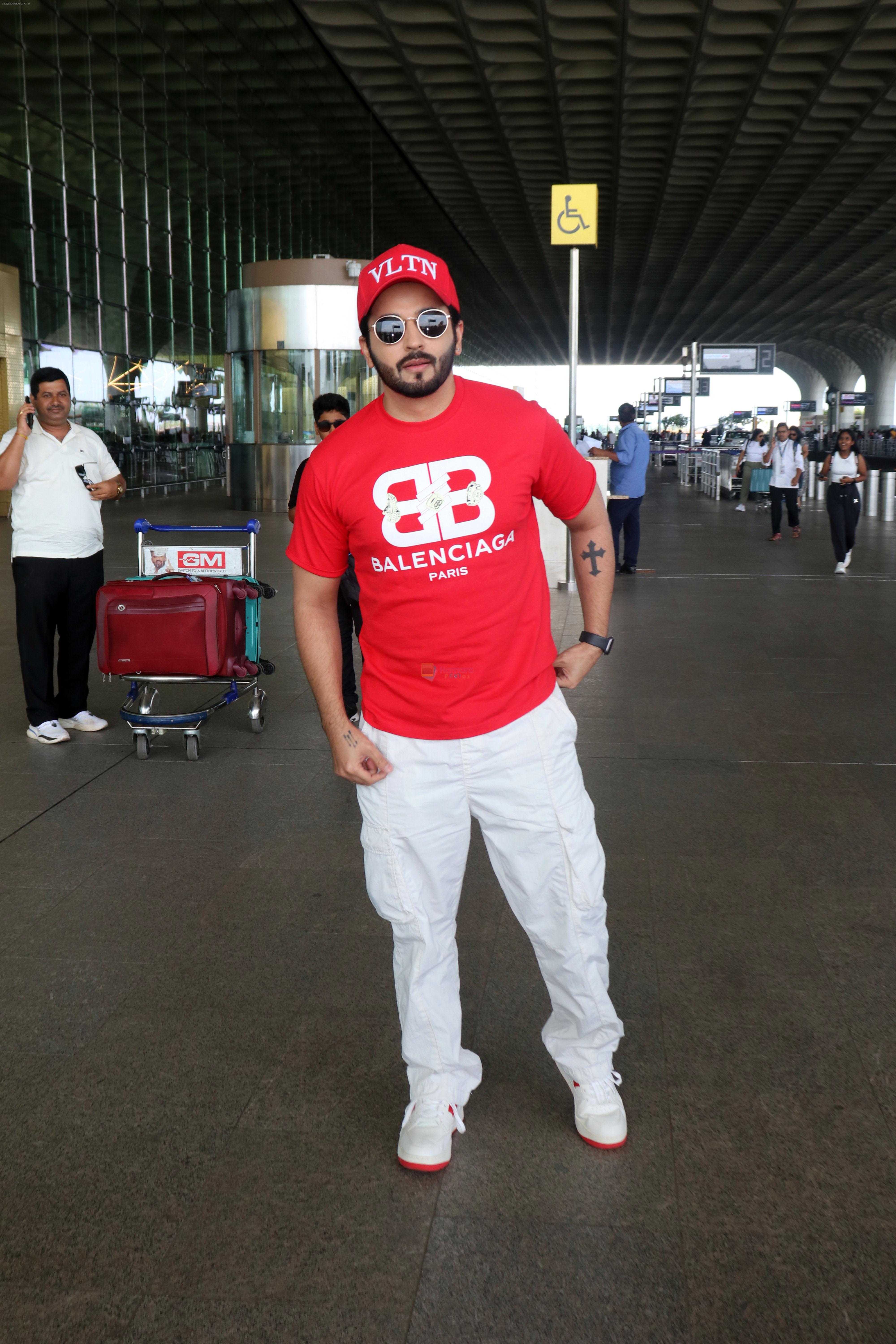 Dheeraj Dhoopar wearing VLTN Cap Balenciaga Paris T-Shirt White Pants and Shoes with red sole on 24 May 2023