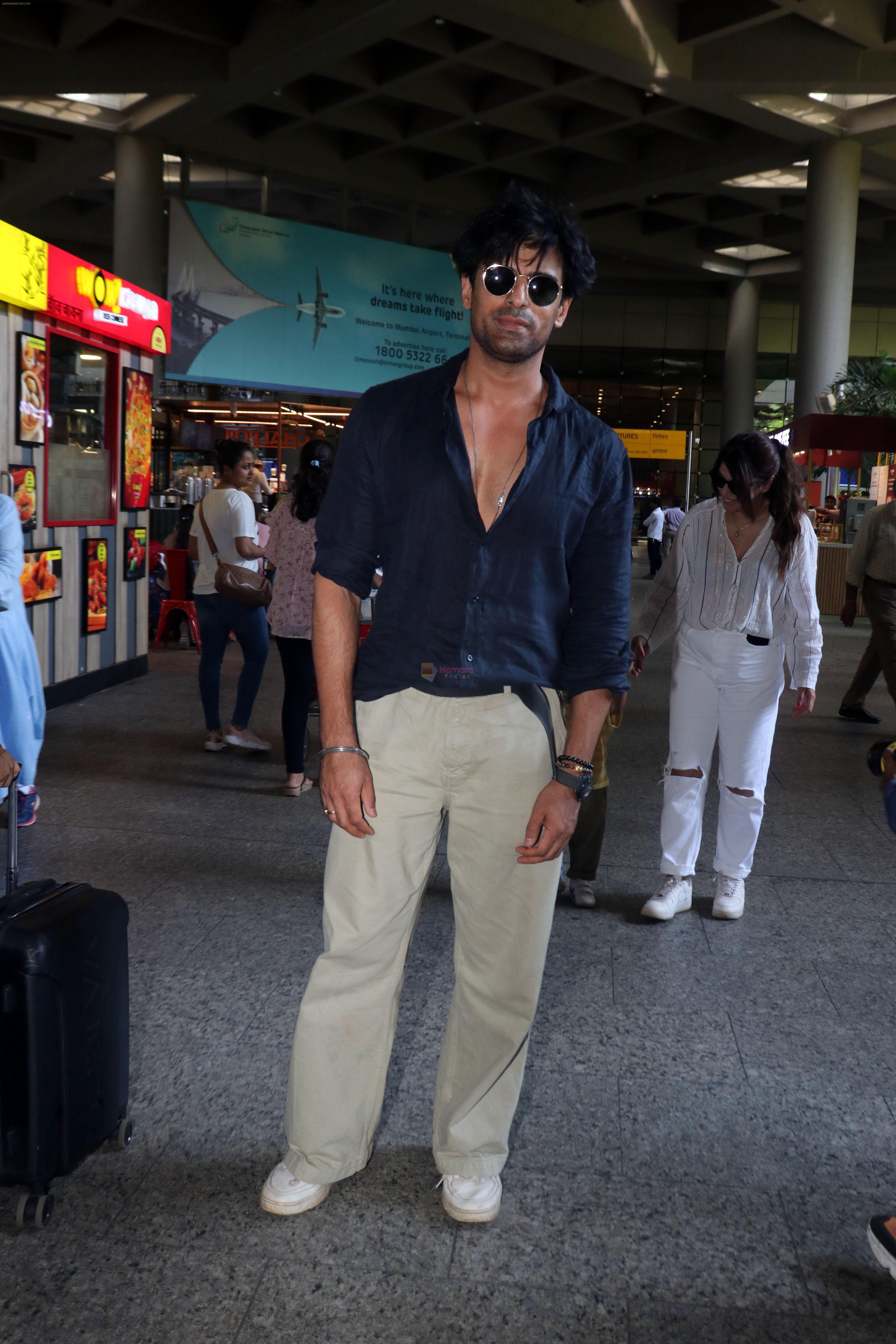 Mohit Malik, Addite Malik along with their child at the aiport on 20th May 2023