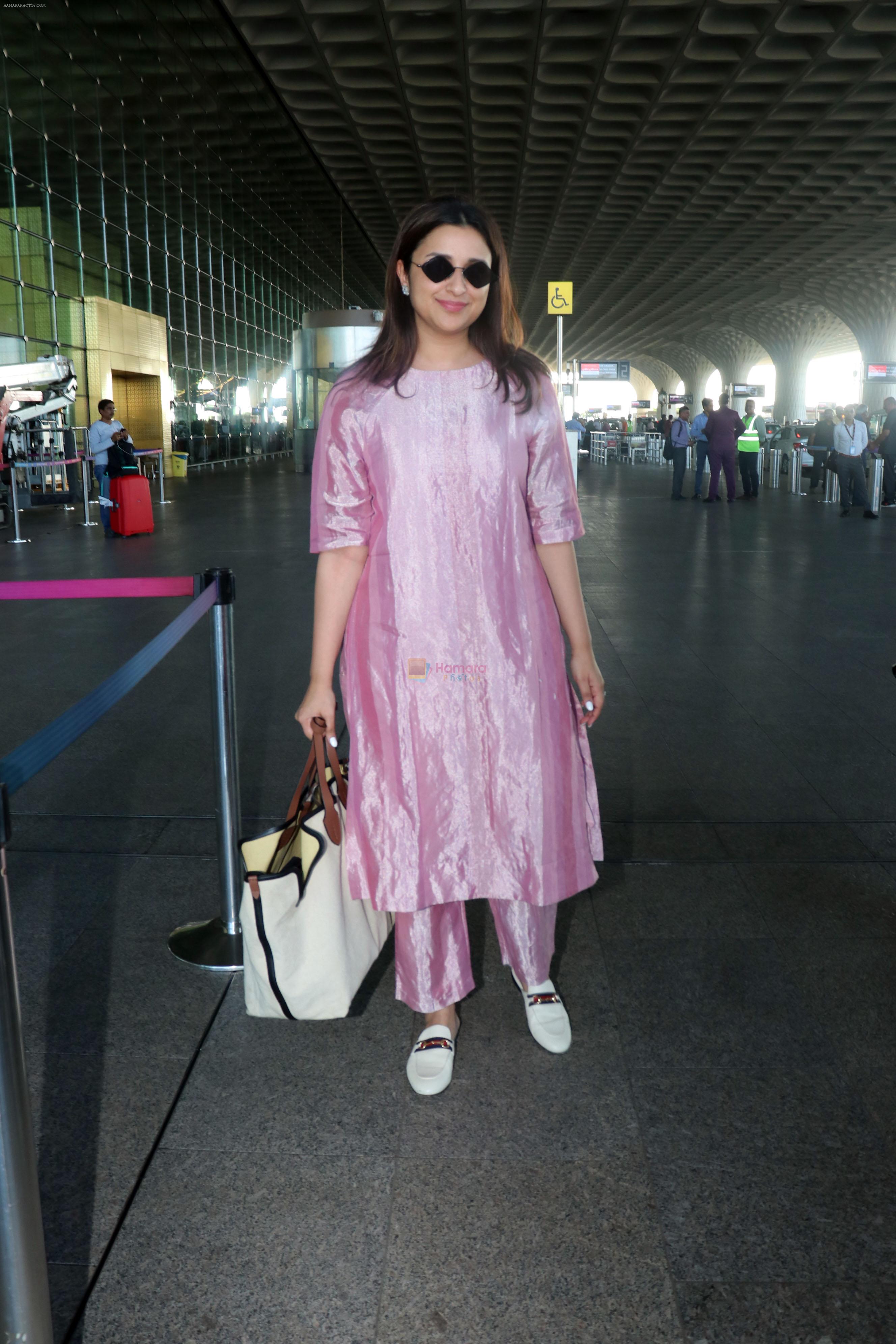 Parineeti Chopra wearing a bright pink dress white shoes sunglasses Burberry Horseferry Print Canvas leather handbag
