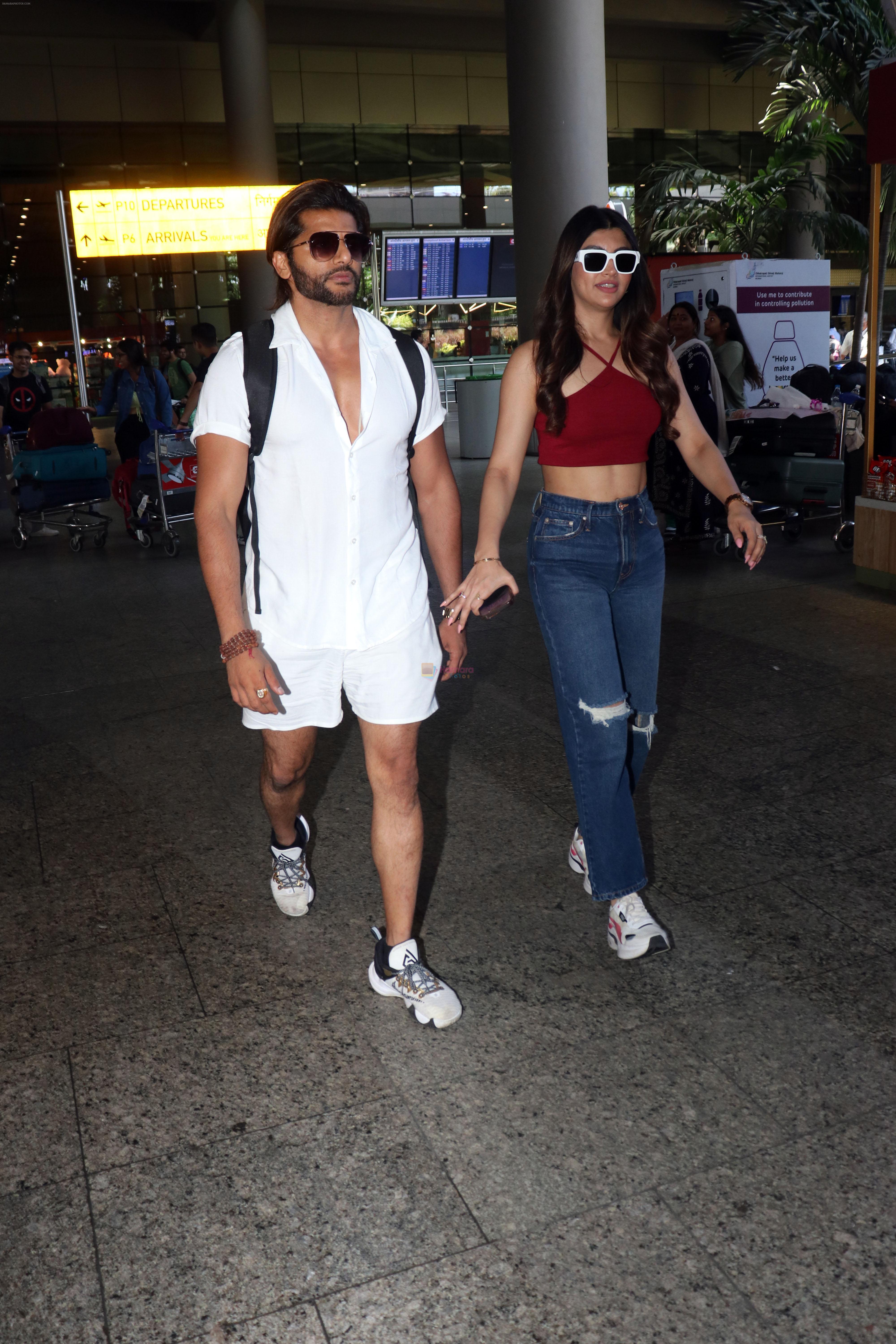 Akanksha Puri in Ravishing Maroon and Karanvir Bohra in Effortless Whites