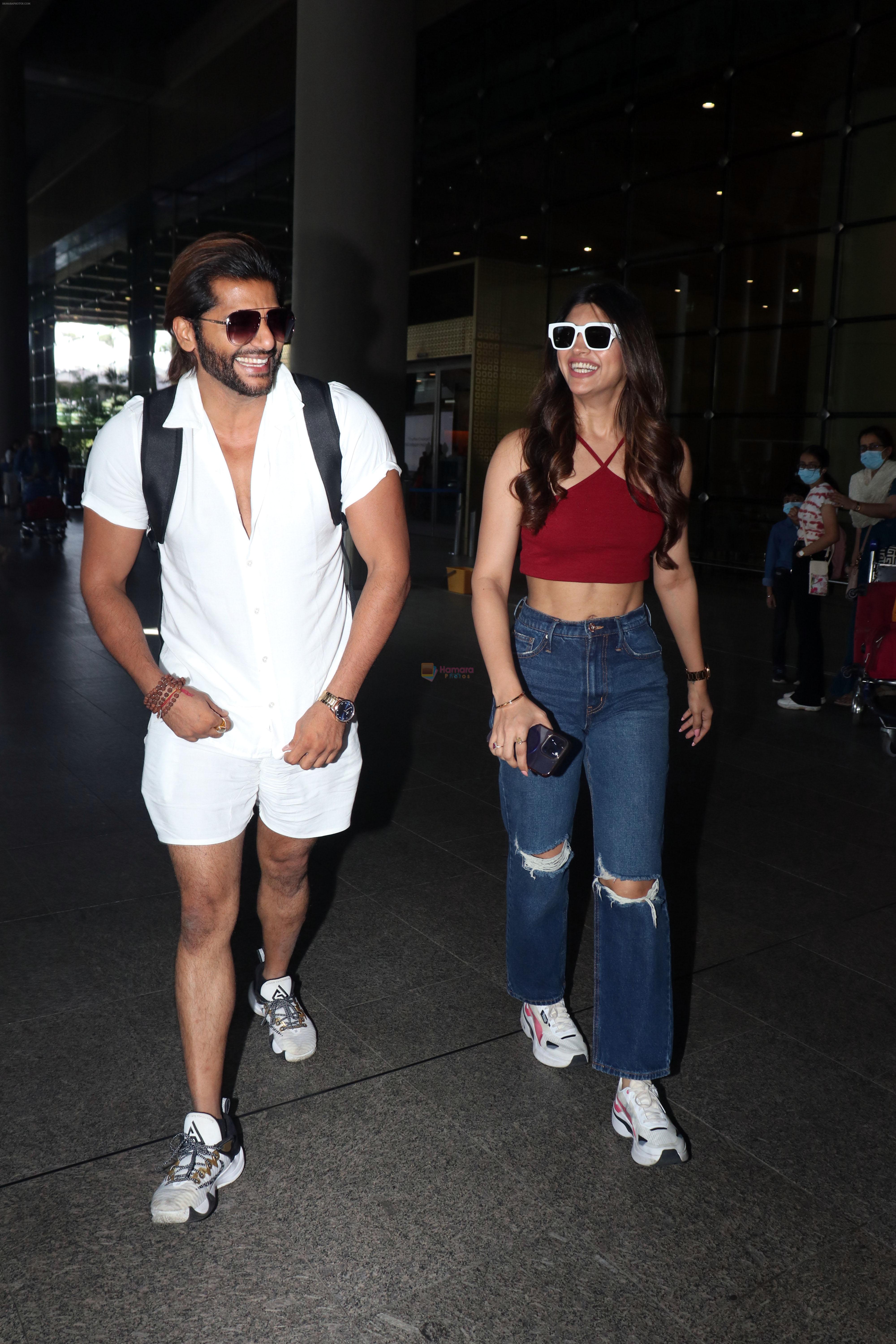 Akanksha Puri in Ravishing Maroon and Karanvir Bohra in Effortless Whites