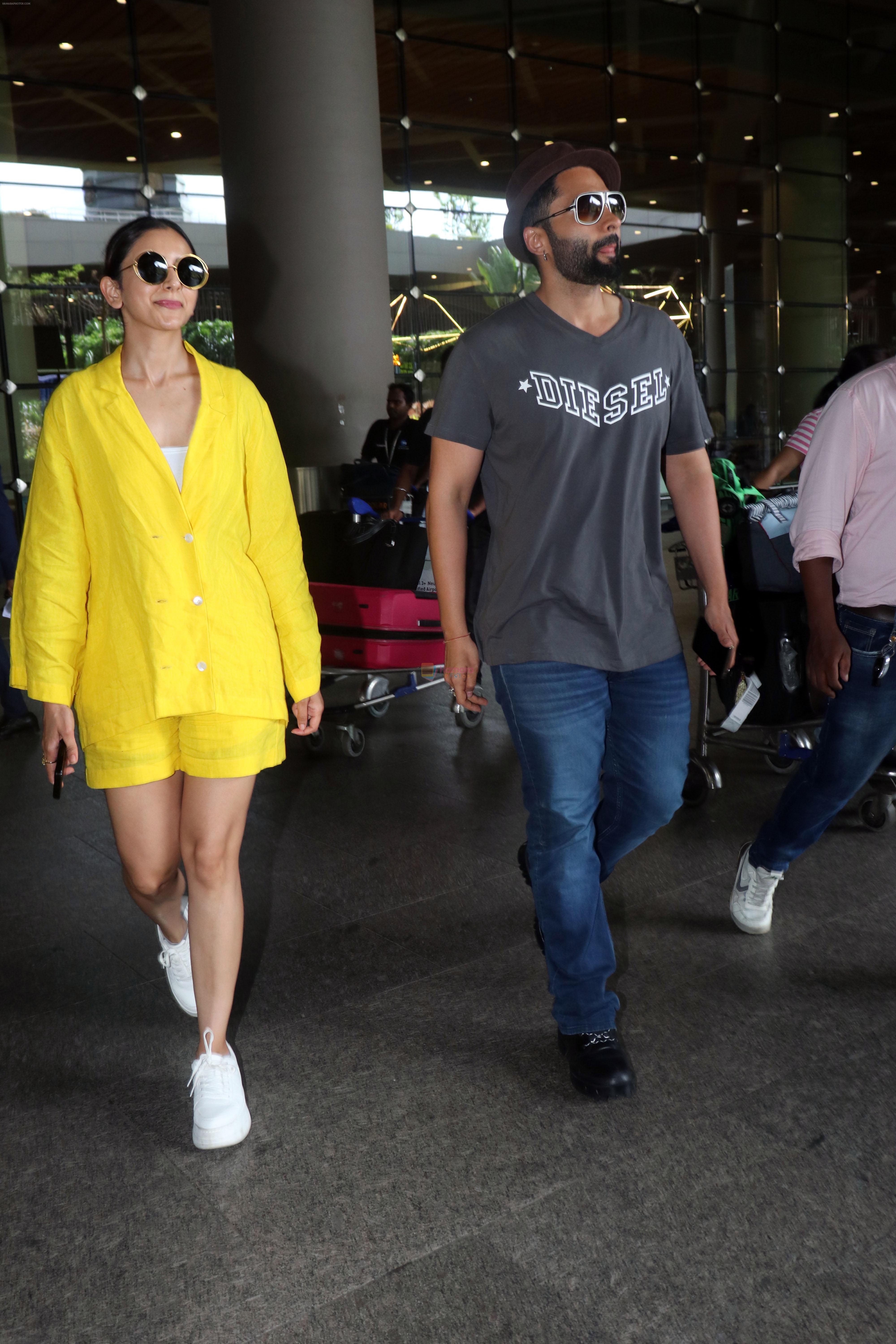Rakul Preet Singh dressed in yellow Kiara Jacket and Jackky Bhagnani in a slate Diesel Tshirt