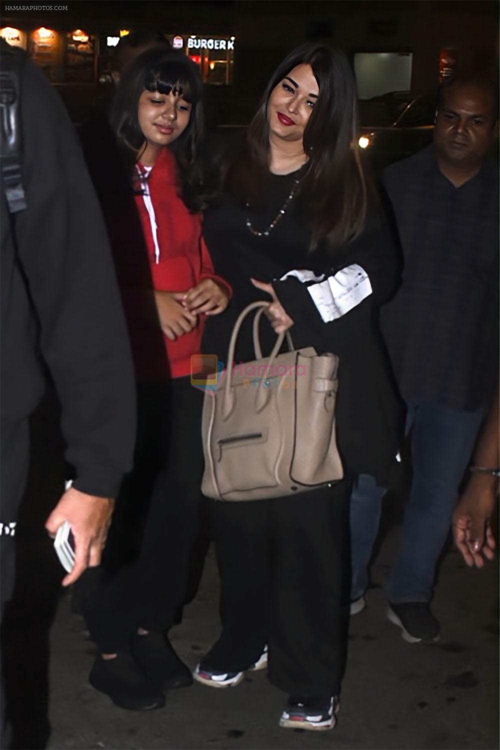 Aishwarya Rai Bachchan with hubby Abhishek Bachchan and daughter Aaradhya Bachchan at the airport on 14 Jun 2023