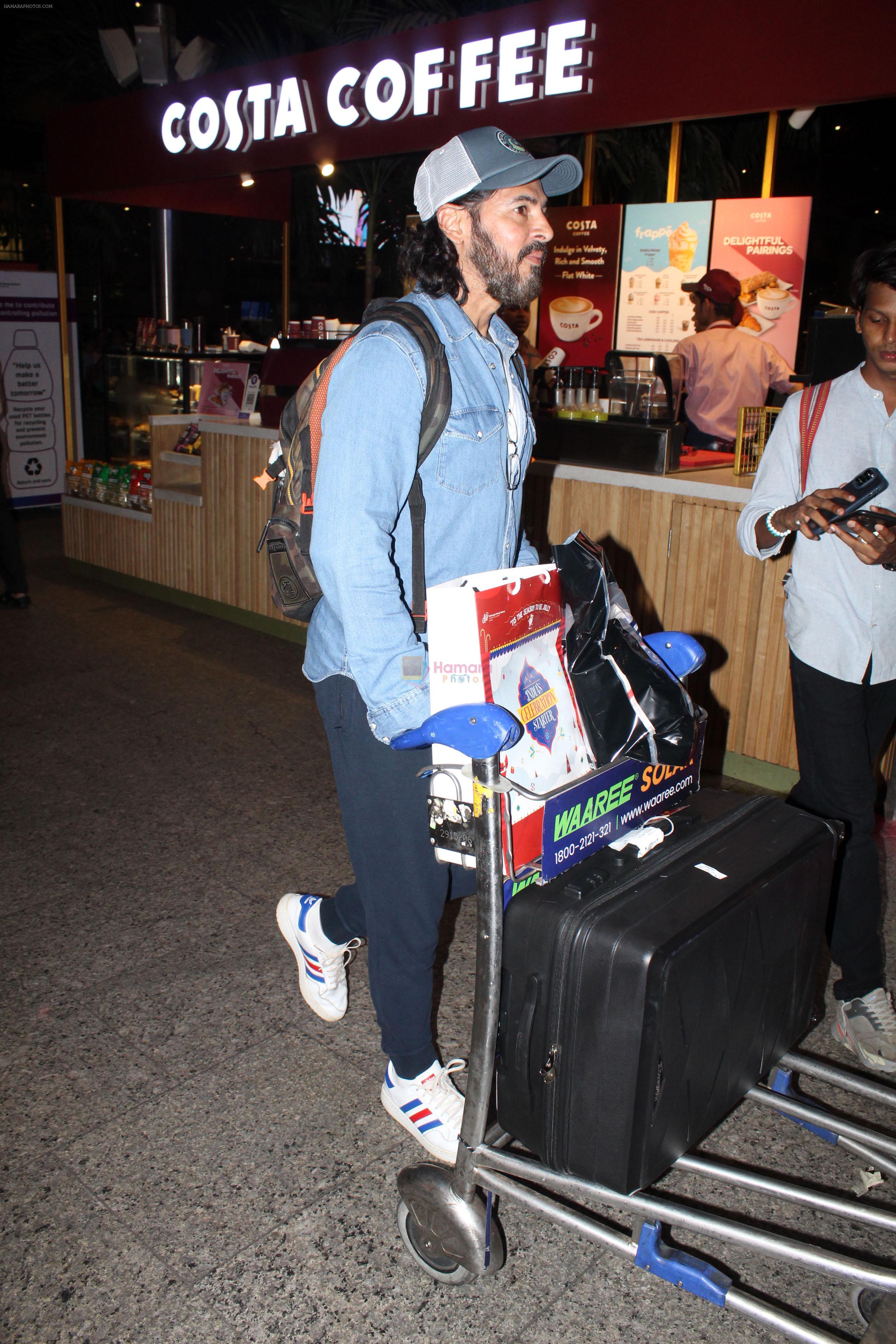 Dino Morea dressed in a jeans shirt and sweat pant with gray hat spotted at airport on 13 Jun 2023