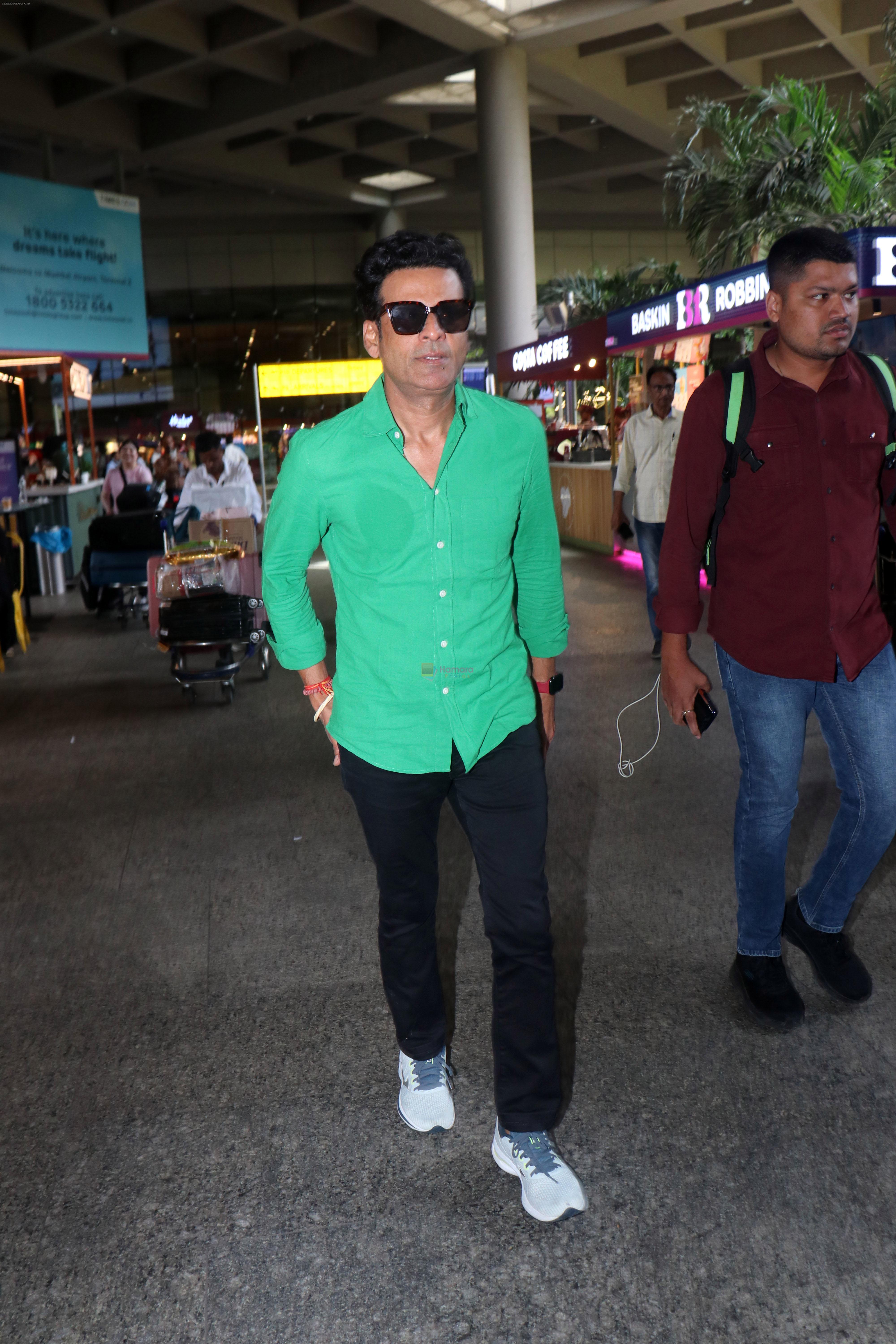 Manoj Bajpayee seen at airport in green shirt and black pant on 17 Jun 2023