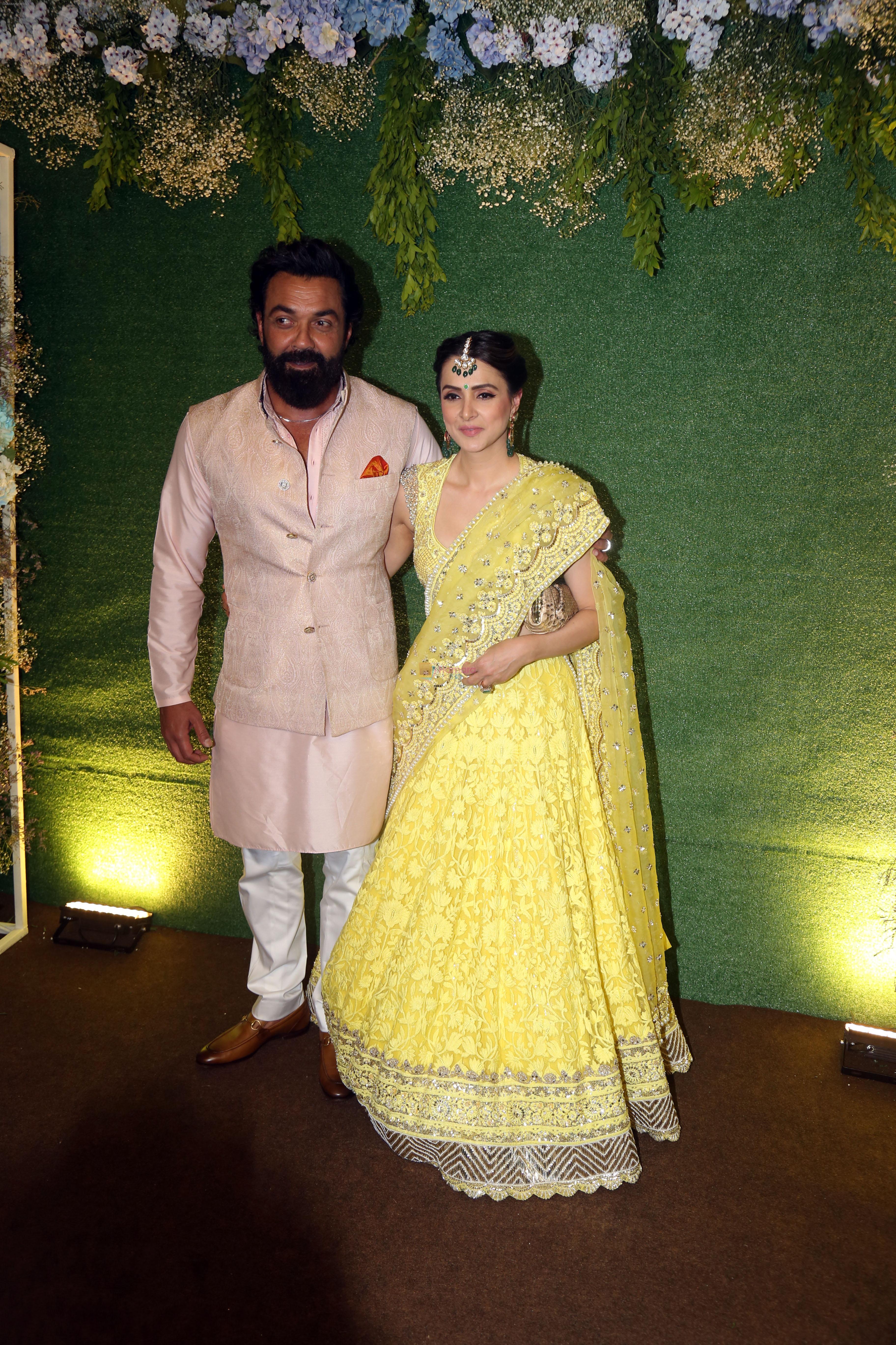 Bobby Deol with spouse Tanya Deol pose for camera after the sangeet function on 16 Jun 2023