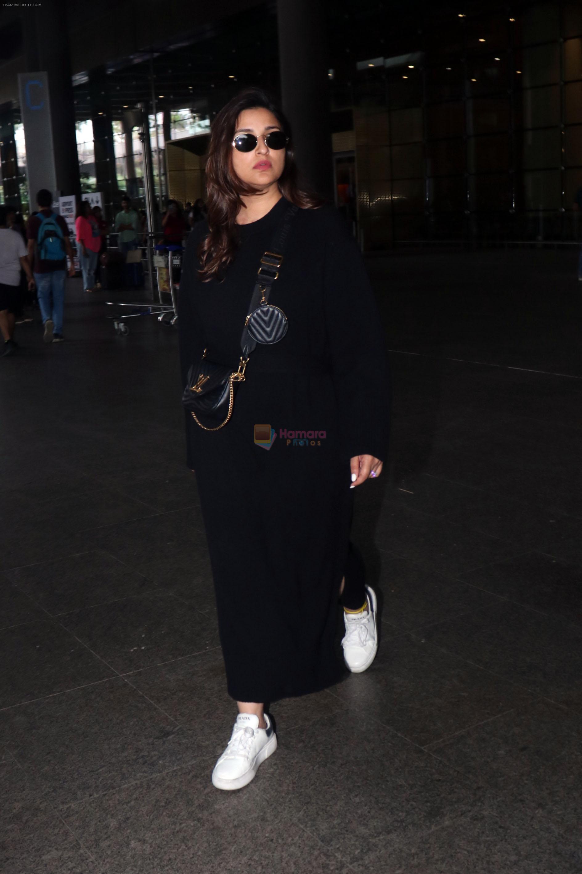 Parineeti Chopra wearing black dress and white shoes at airport on 16 Jun 2023