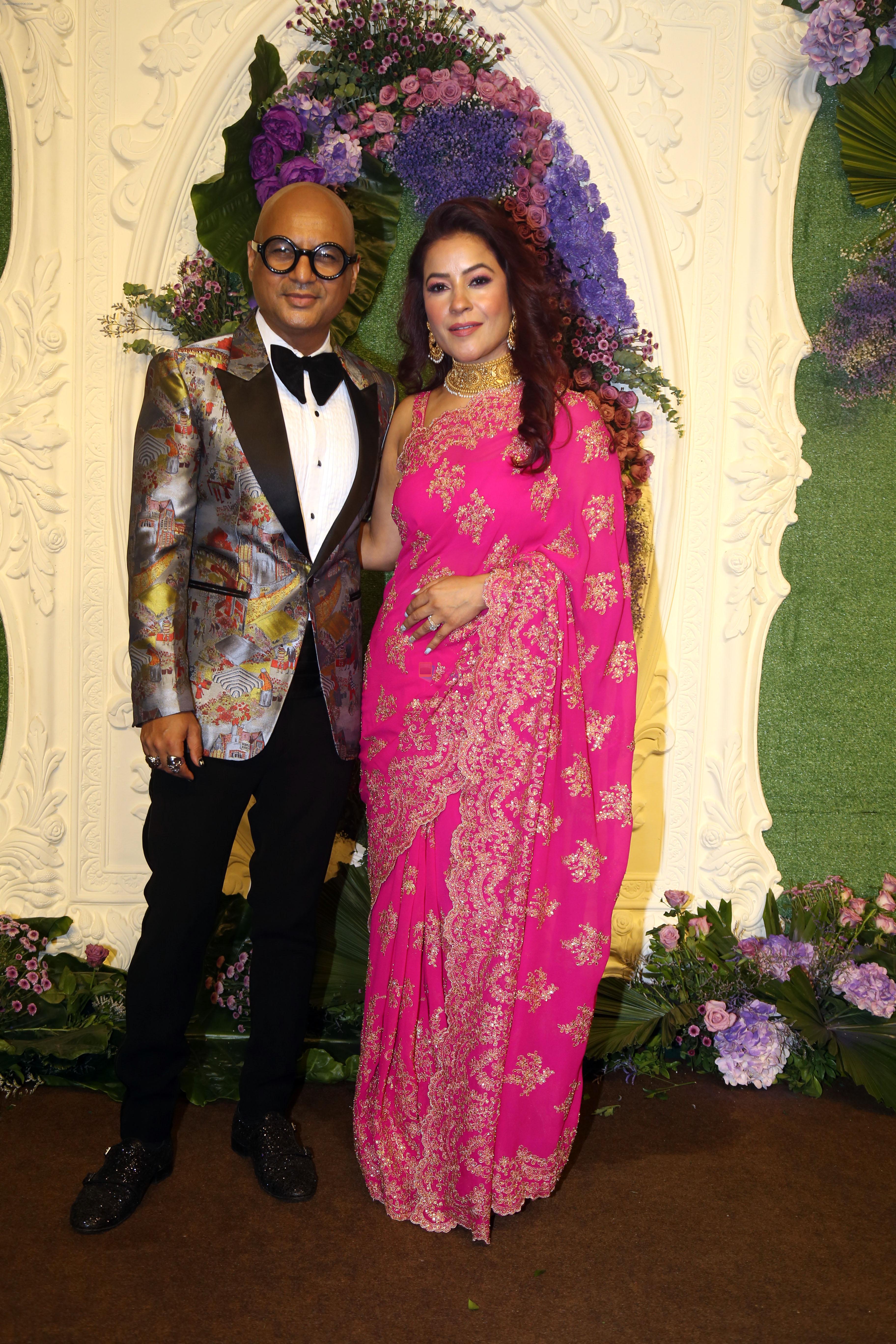Aalim Hakim with wife Shano Hanspal Pose for media at the reception of Karan Deol and Drisha Acharya on 18 Jun 2023