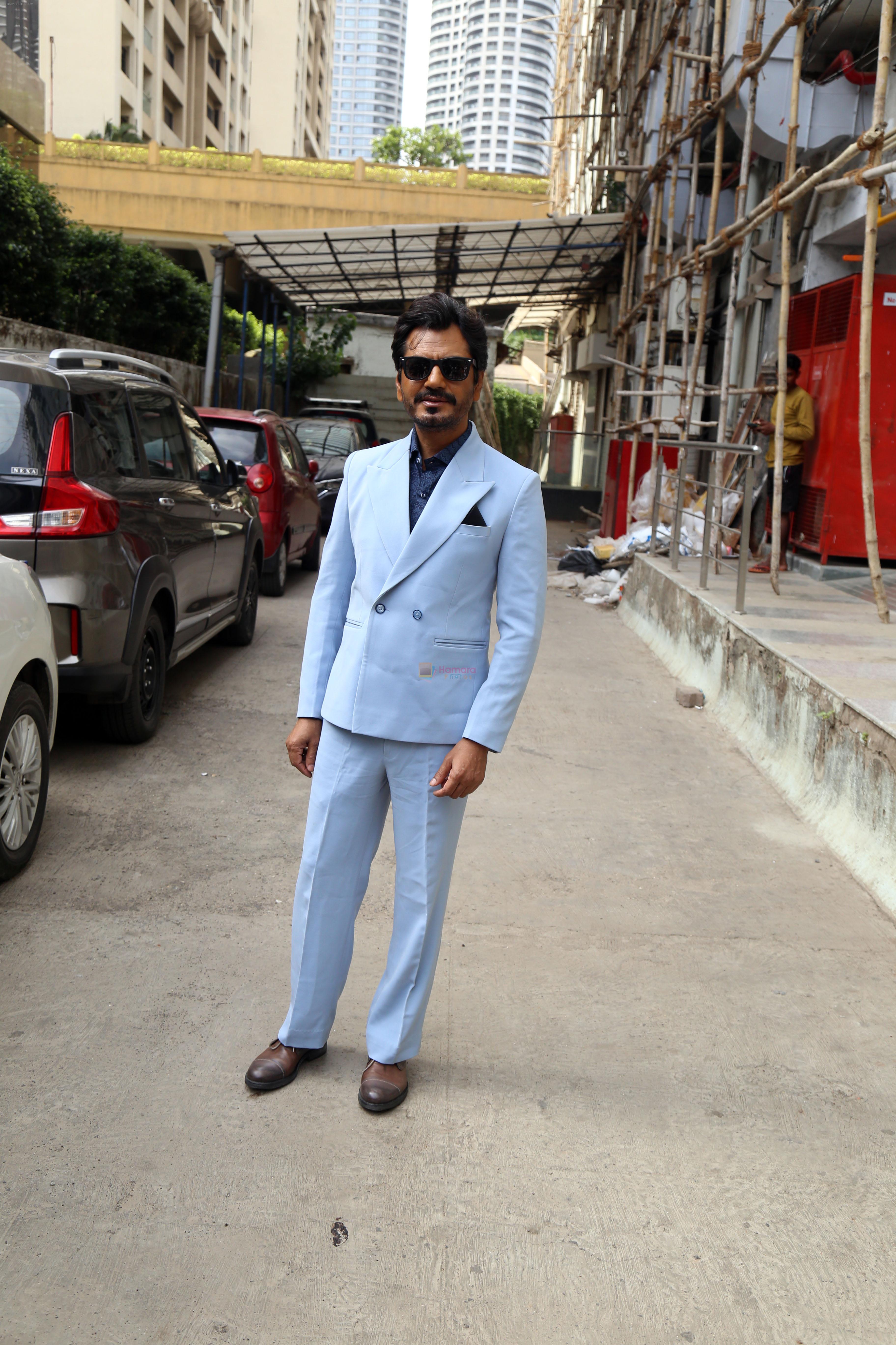 Nawazuddin Siddiqui pose for camera to promote film Tiku Weds Sheru at Radio Mirchi on 19 Jun 2023