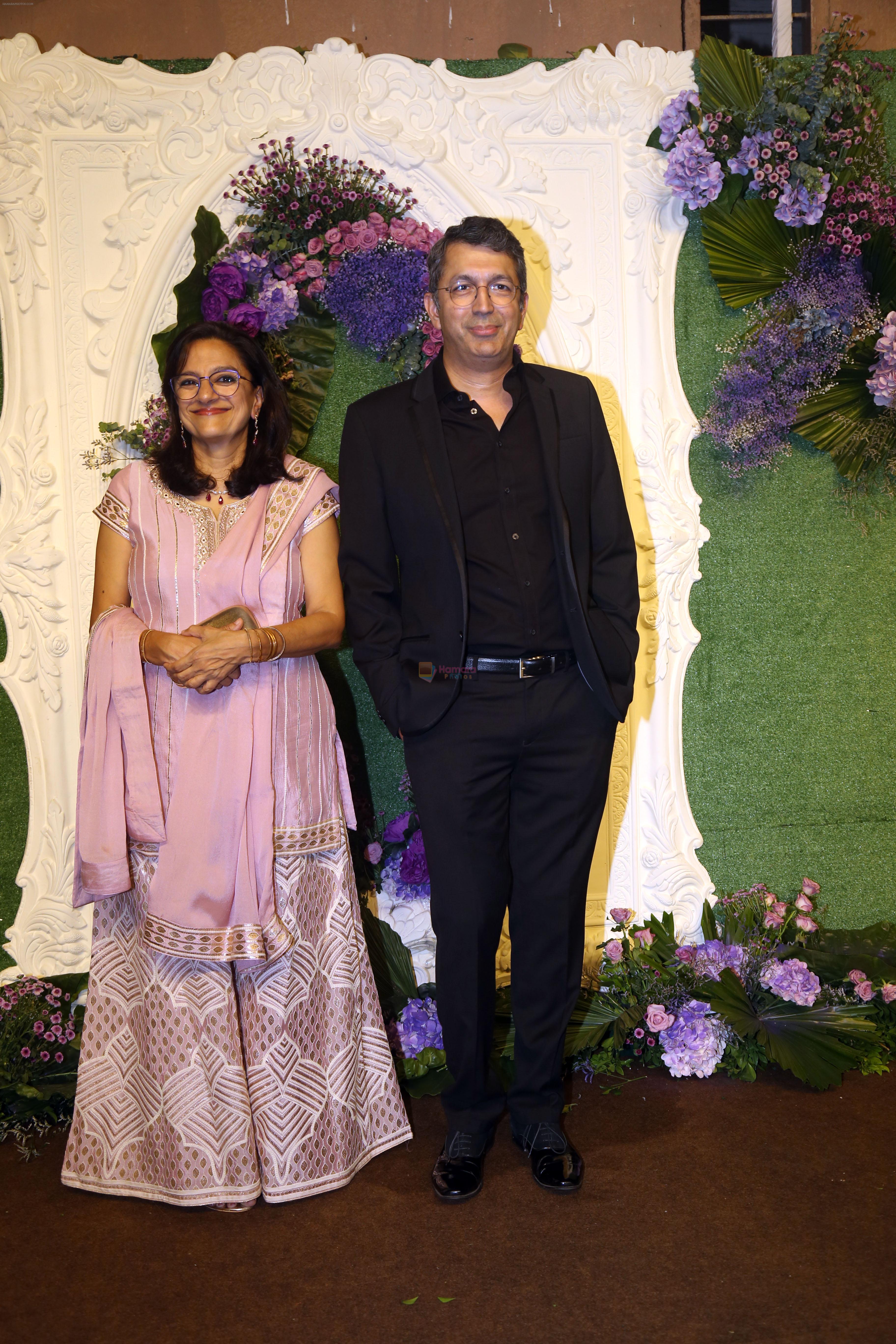 Kunal Kohli and Ravina Kohli Pose for media at the reception of Karan Deol and Drisha Acharya on 18 Jun 2023