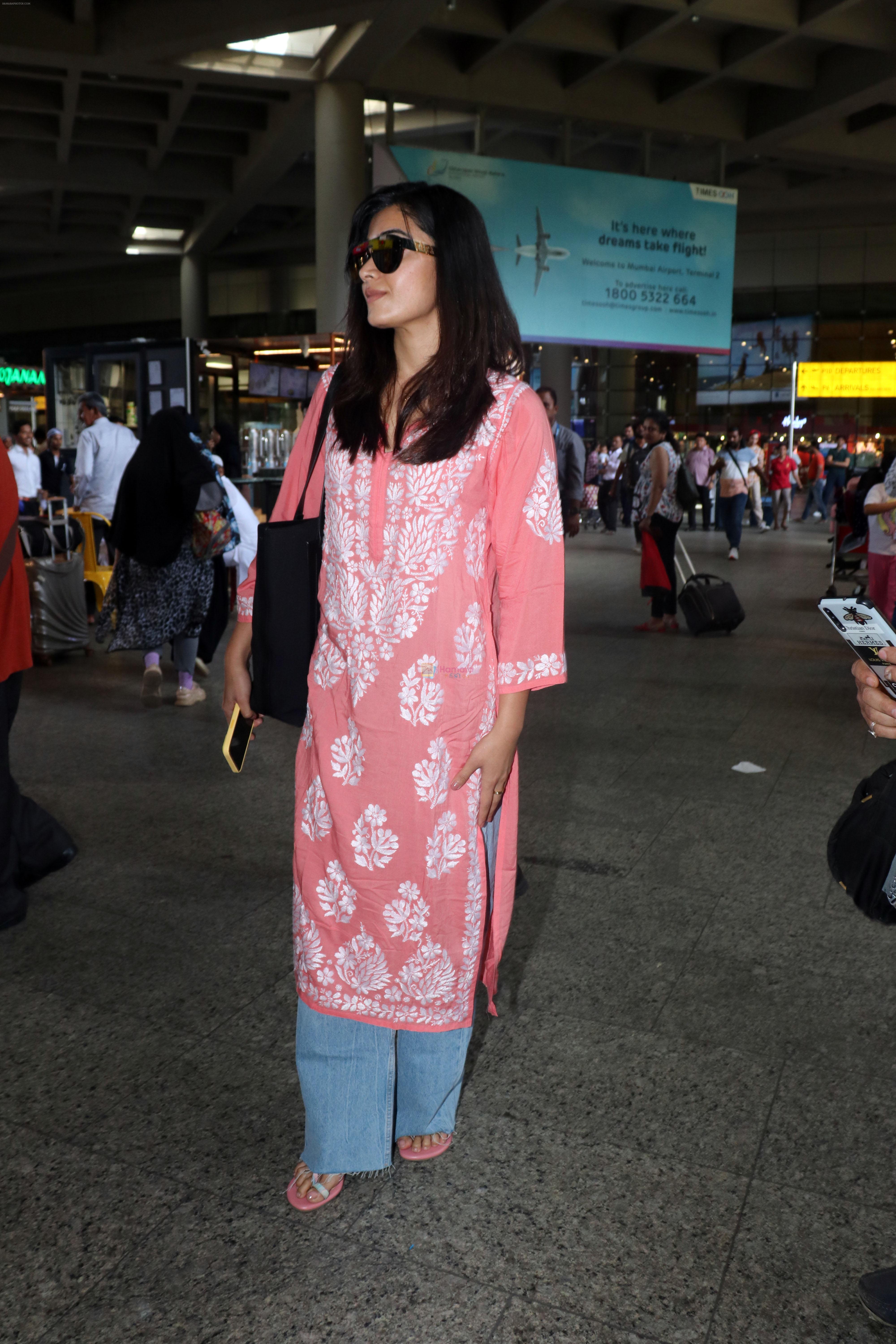 Rashmika Mandanna seen in a pink top and shredded jeans at the airport on 23 Jun 2023