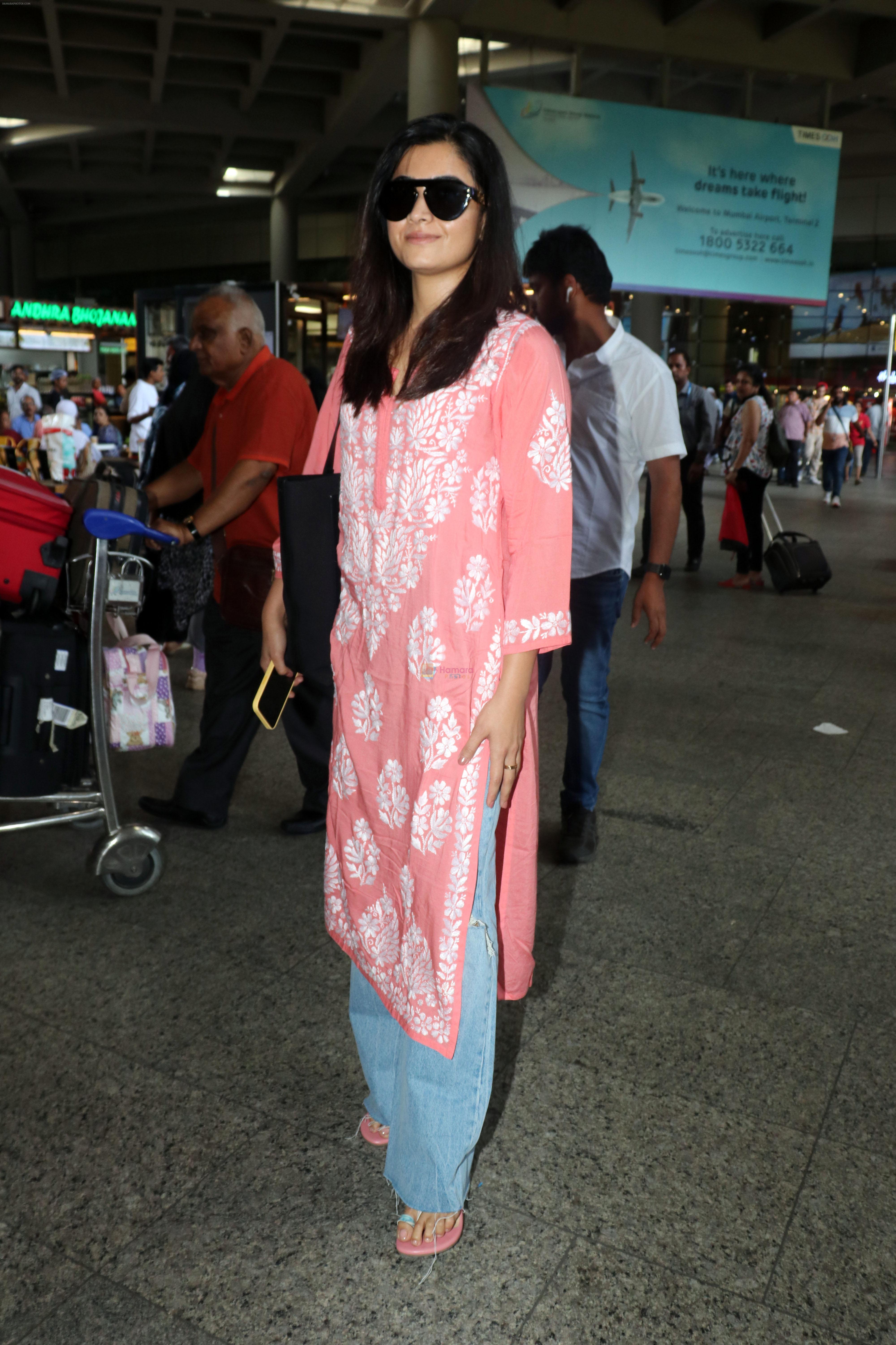 Rashmika Mandanna seen in a pink top and shredded jeans at the airport on 23 Jun 2023