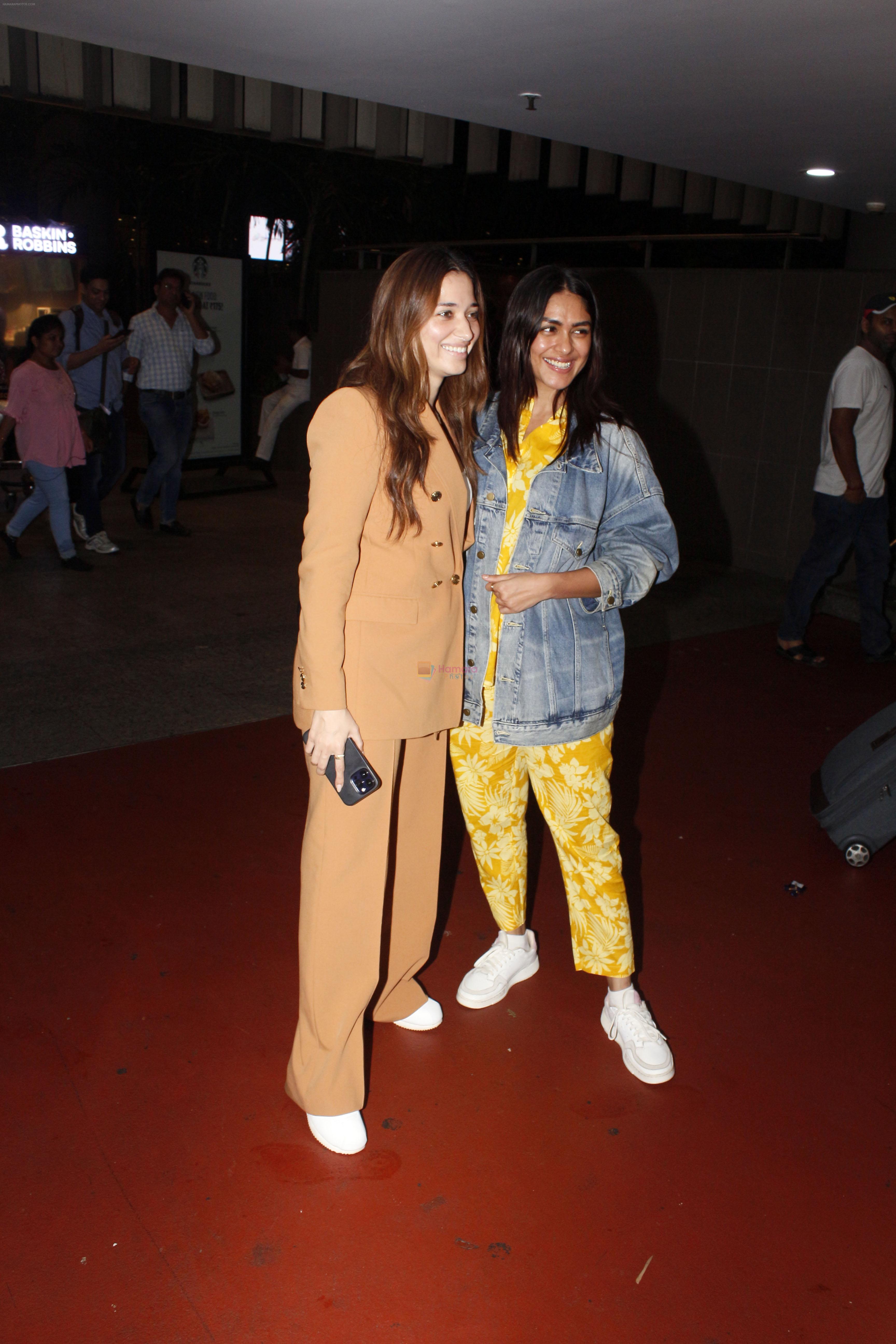 Tamanna Bhatia and Mrunal Thakur seen at the airport on 26 Jun 2023
