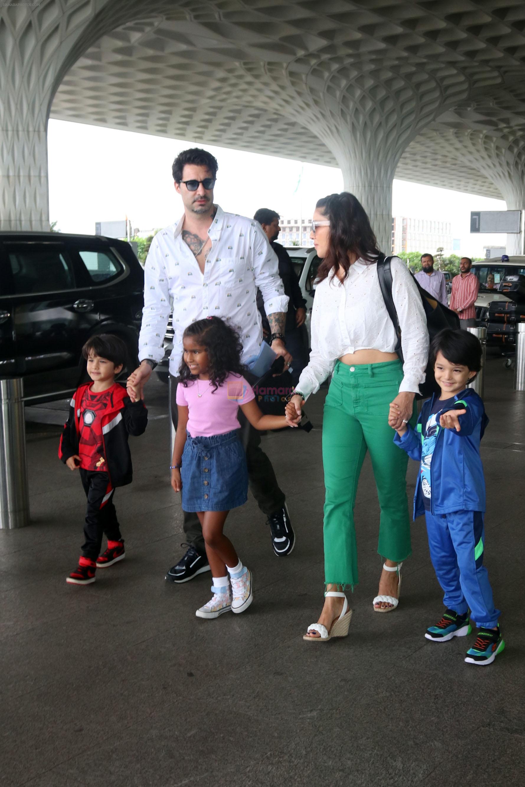 Sunny Leone with husband Daniel Weber and kids Nisha, Asher, Noah seen at the airport on 7 July 2023