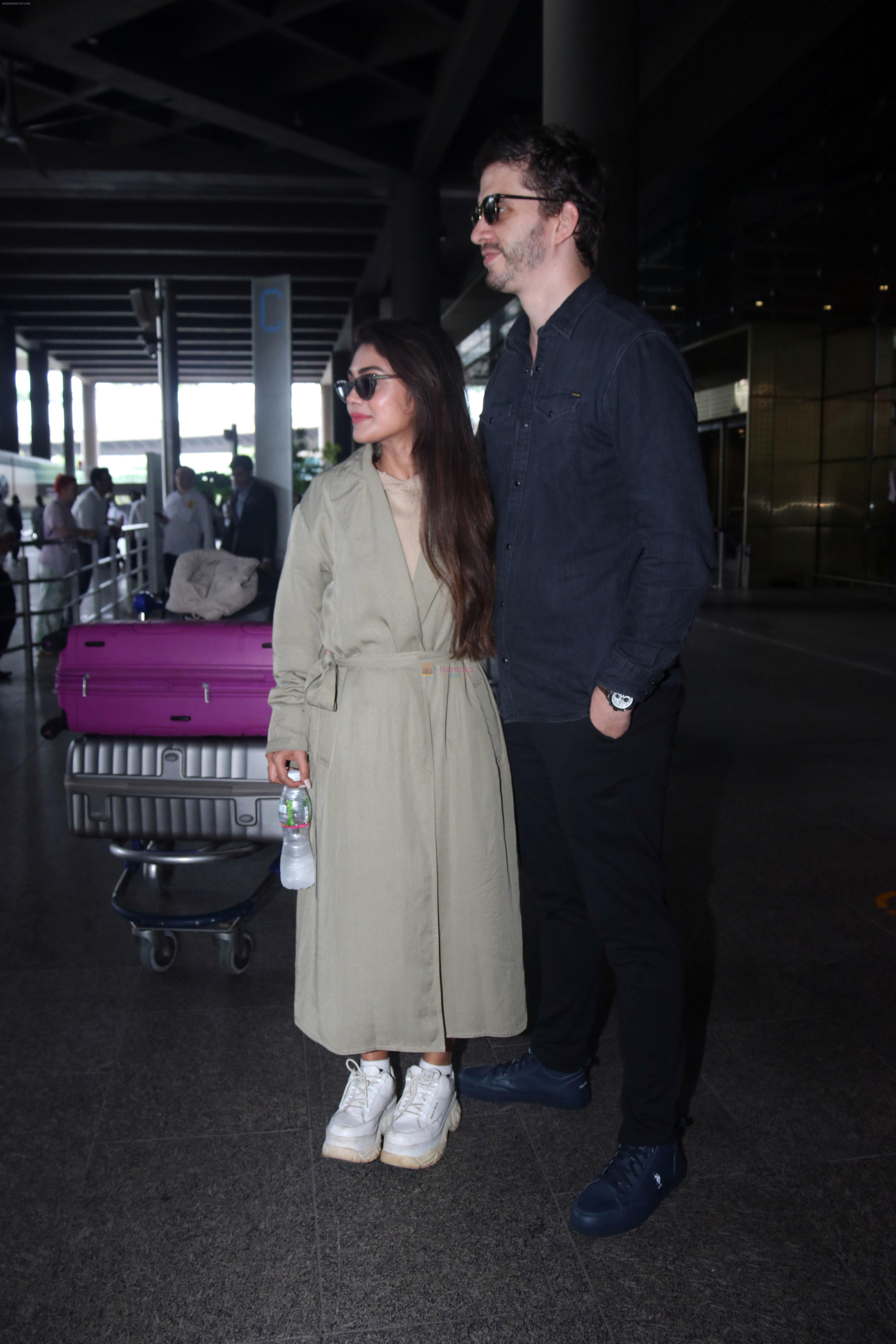 Sreejita De with husband Michael Blohm-Pape seen at the airport on 7 July 2023