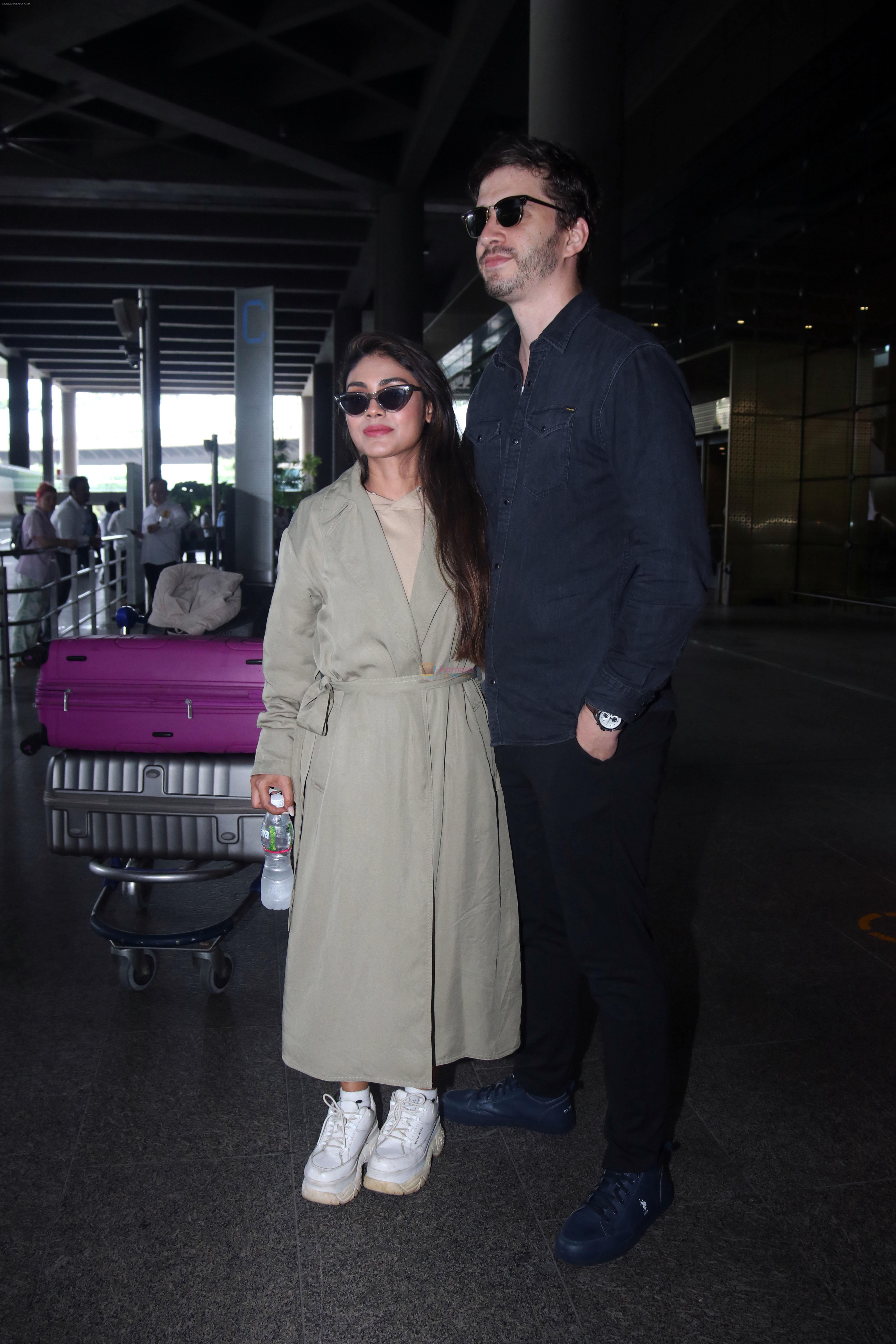 Sreejita De with husband Michael Blohm-Pape seen at the airport on 7 July 2023