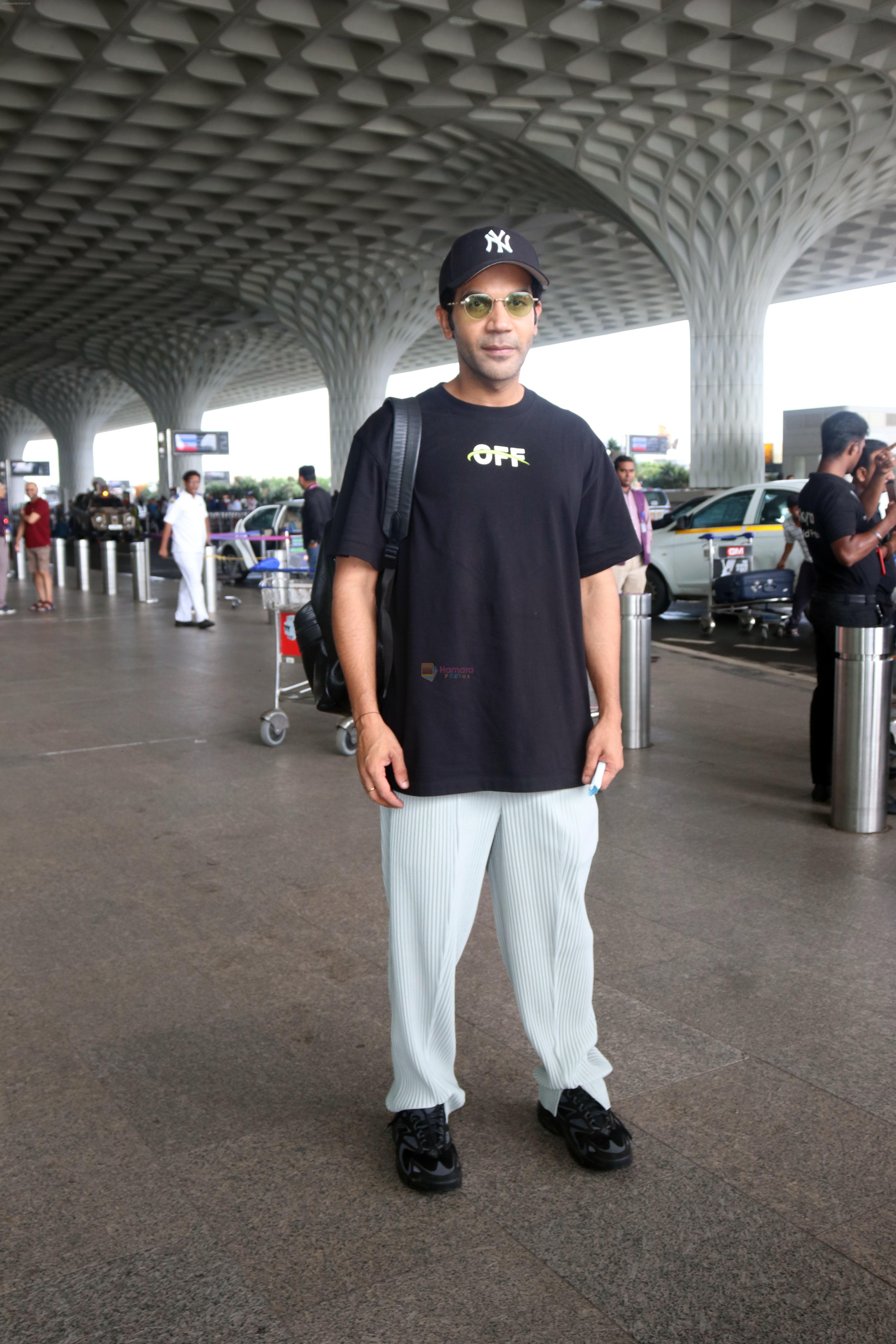 Rajkummar Rao seen at the airport wearing black and light sporting a Yankees cap on 8 July 2023