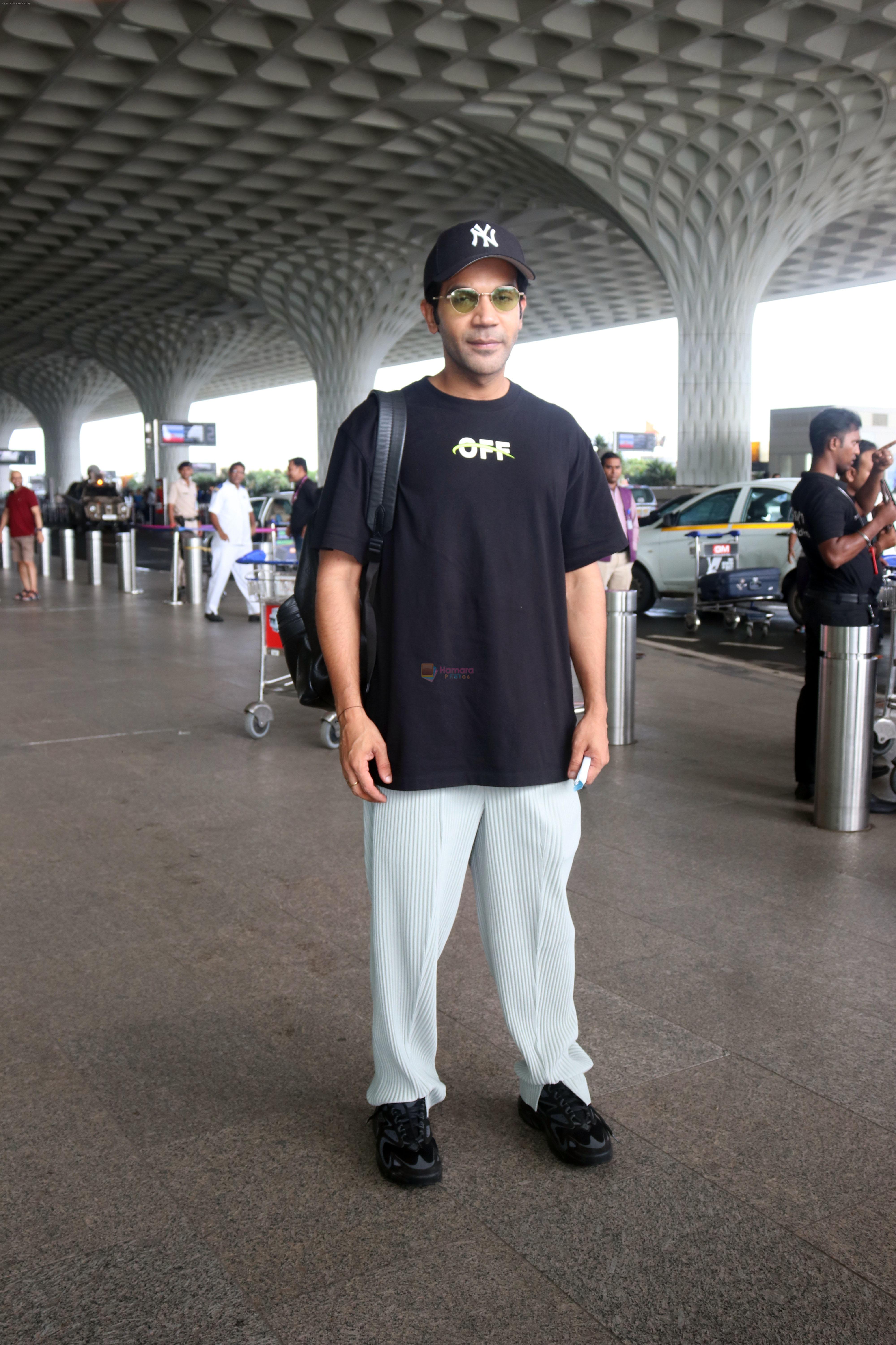 Rajkummar Rao seen at the airport wearing black and light sporting a Yankees cap on 8 July 2023