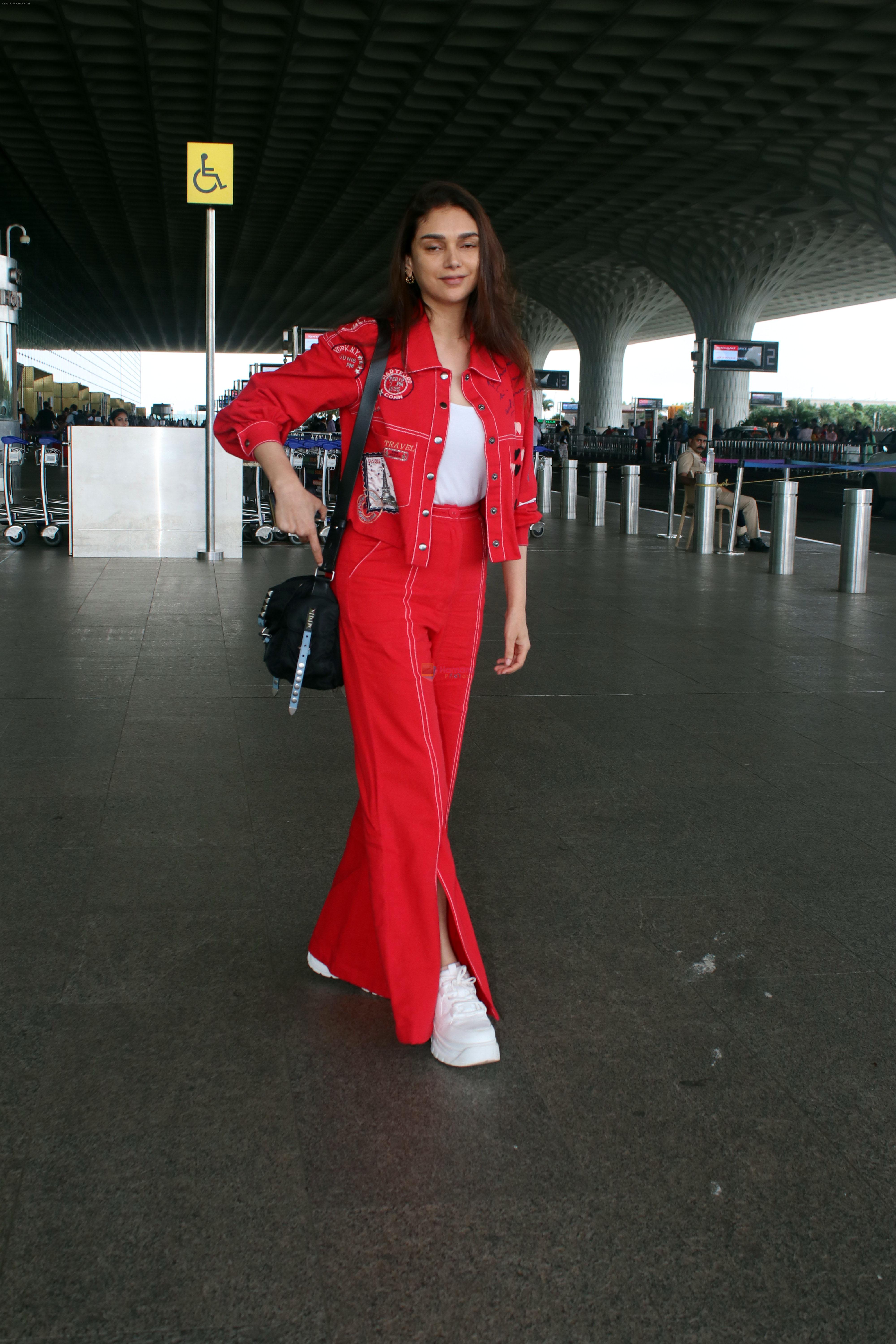 Aditi Rao Hydari in red seen at the airport on 30 July 2023