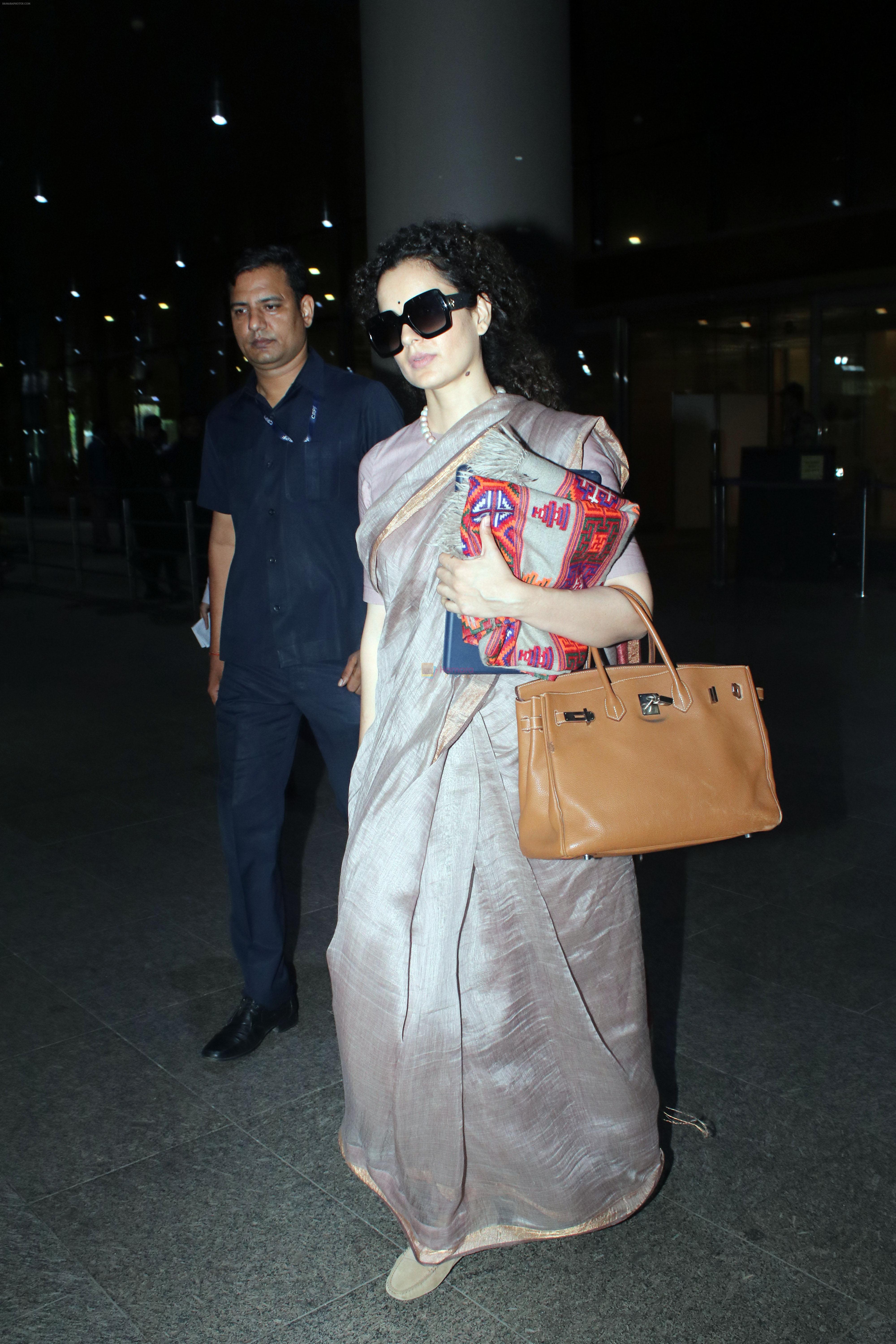 Kangana Ranaut dressed in a saree spotted at airport arrival on 10th August 2023