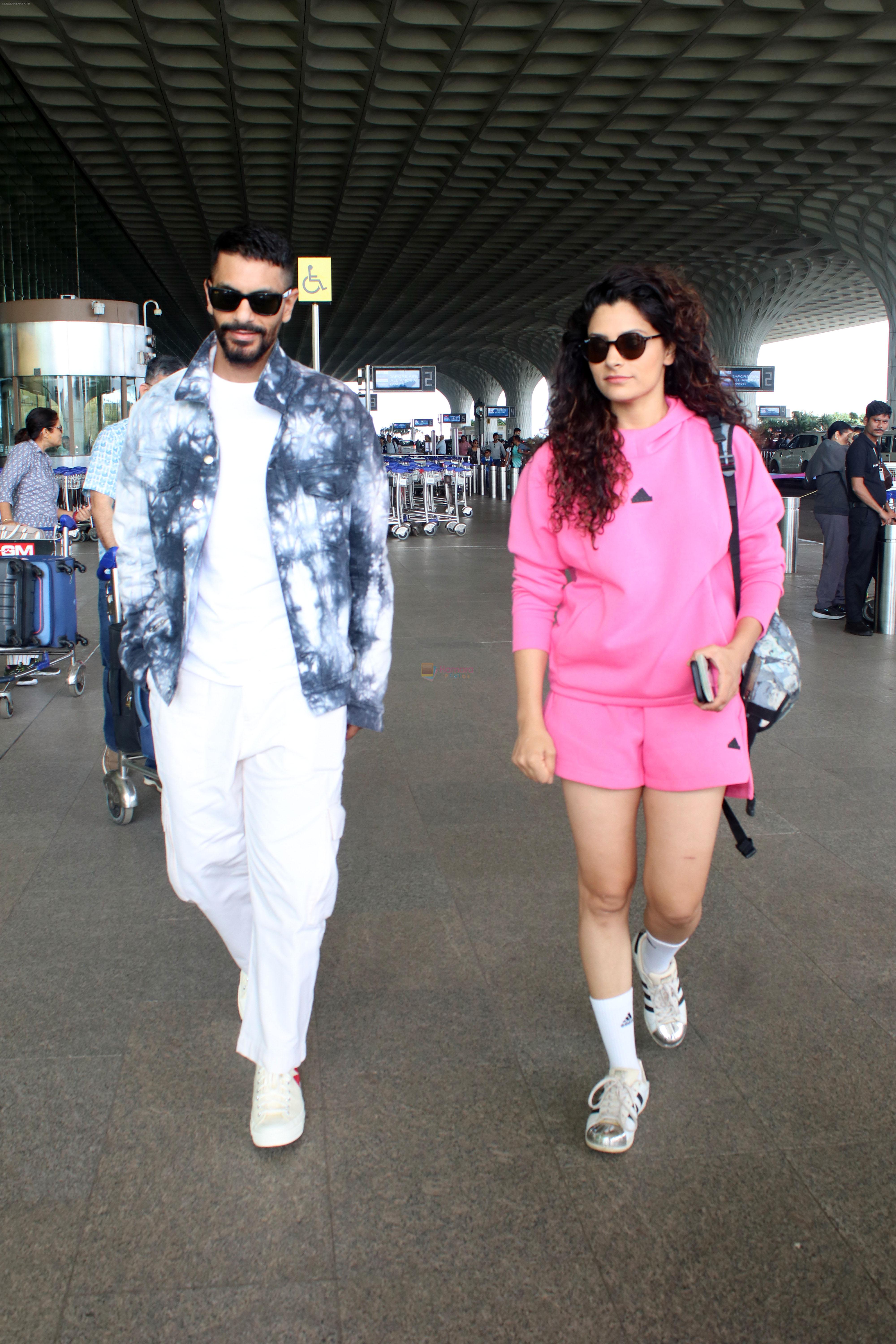 Angad Bedi and Saiyami Kher spotted at the Airport on 11th August 2023