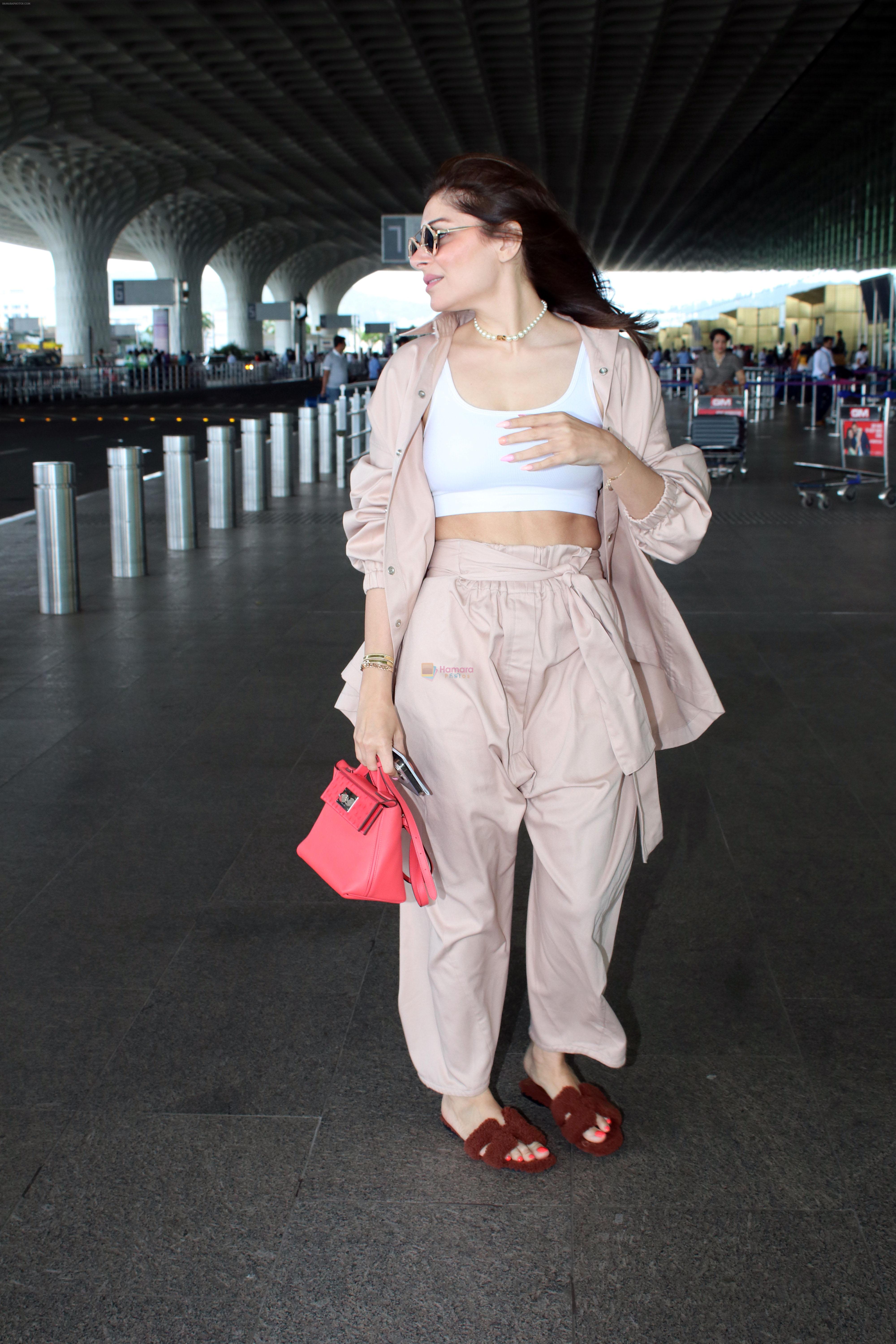 Kanika Kapoor Spotted at Airport Departure on 20th August 2023