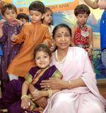 (August)Asha_with_Children.jpg