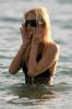 Paris Hilton - Bikini candids - Surfing-5.jpg