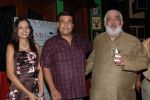 Buddha Mar Gaya Inaugural Party - Brandsmith_s CEO Rahul Mittra & Mrs. Sarina Mittra with Director Rahul Rawail.jpg