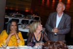 Chairman of the board Paul Atkinson, Leah Atkinson and director Deepa Mehta at the Power Dinner at The 32nd Annual Toronto International Film Festival.jpg