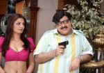 Deepshika and Satish Shah in a still from the movie Dhoom Dhadaka.jpg