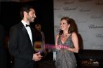 Omar Metwally, Caroline at Chopard Cannes Film Festival.jpg