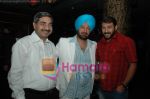 Producer Gulshan Bhatia, Malkit Singh and Manoj Tiwari(bhojpuri singer) at Malkit Singh_s party and performance at Crown Plaza.jpg