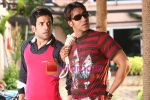Tusshar Kapoor, Ajay Devgan in the Still from movie Golmal Returns (15)~0.jpg