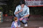 Chang chatting with kiddo with Contestants of Indian Idol 4 participate in the Teach India initiative on 18th November 2008.JPG